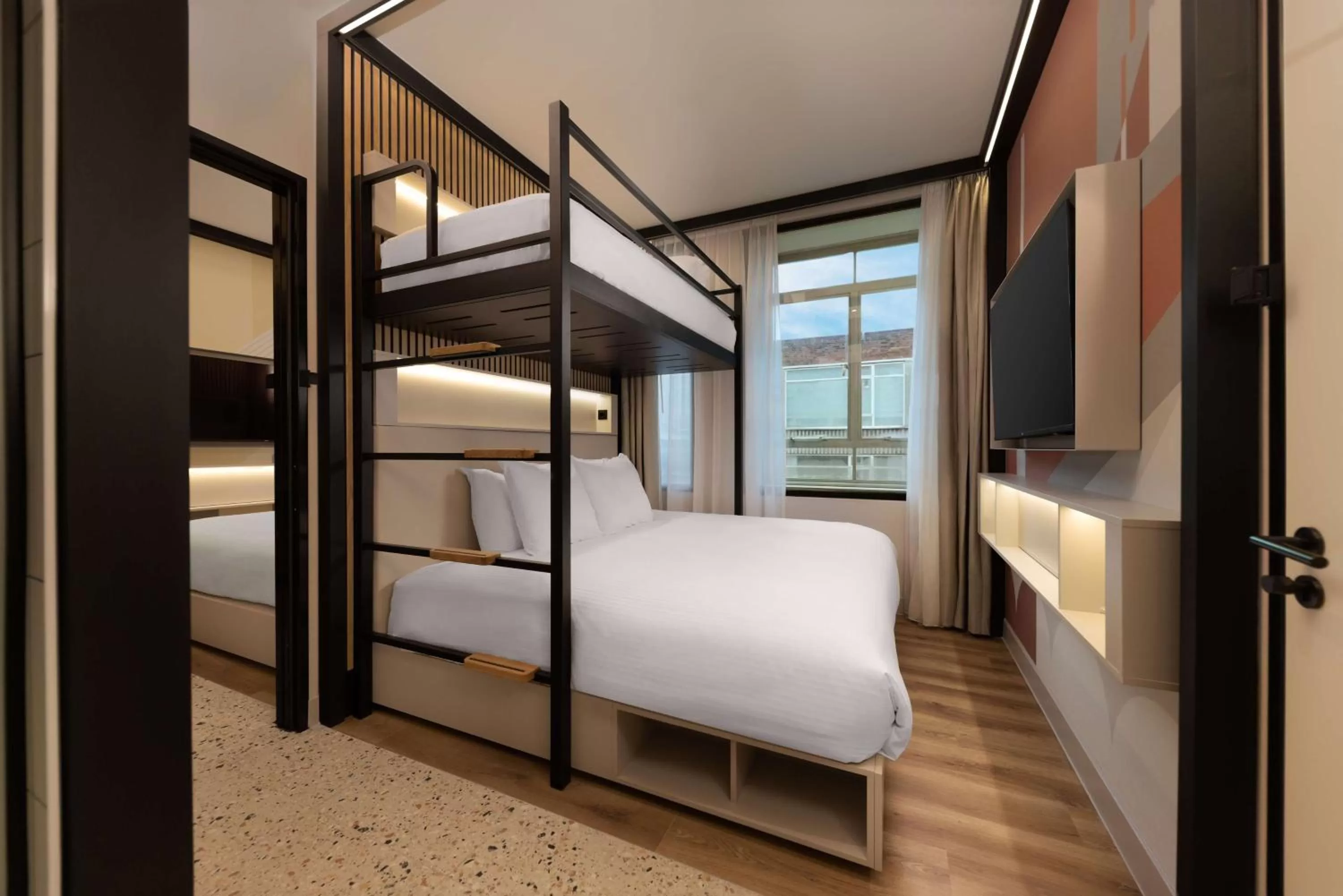 King Bunk Bed Room with Lofted Single Bed in Motto By Hilton Rotterdam Blaak