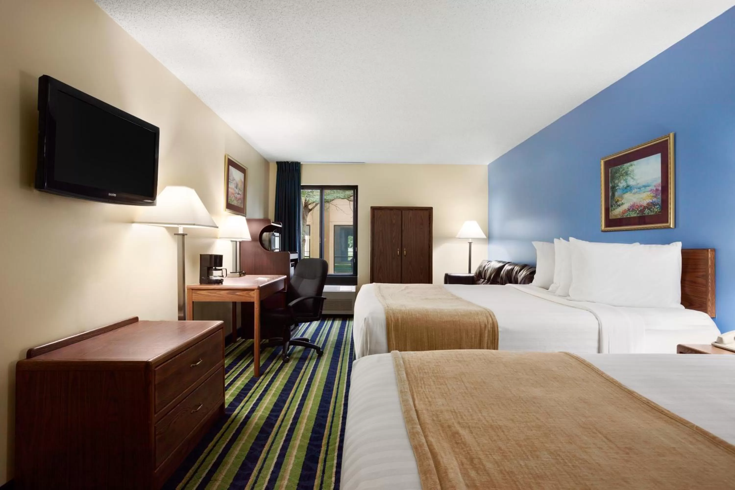 Deluxe Queen Room with Two Queen Beds - Non-Smoking in Days Inn by Wyndham Fargo - West Acres