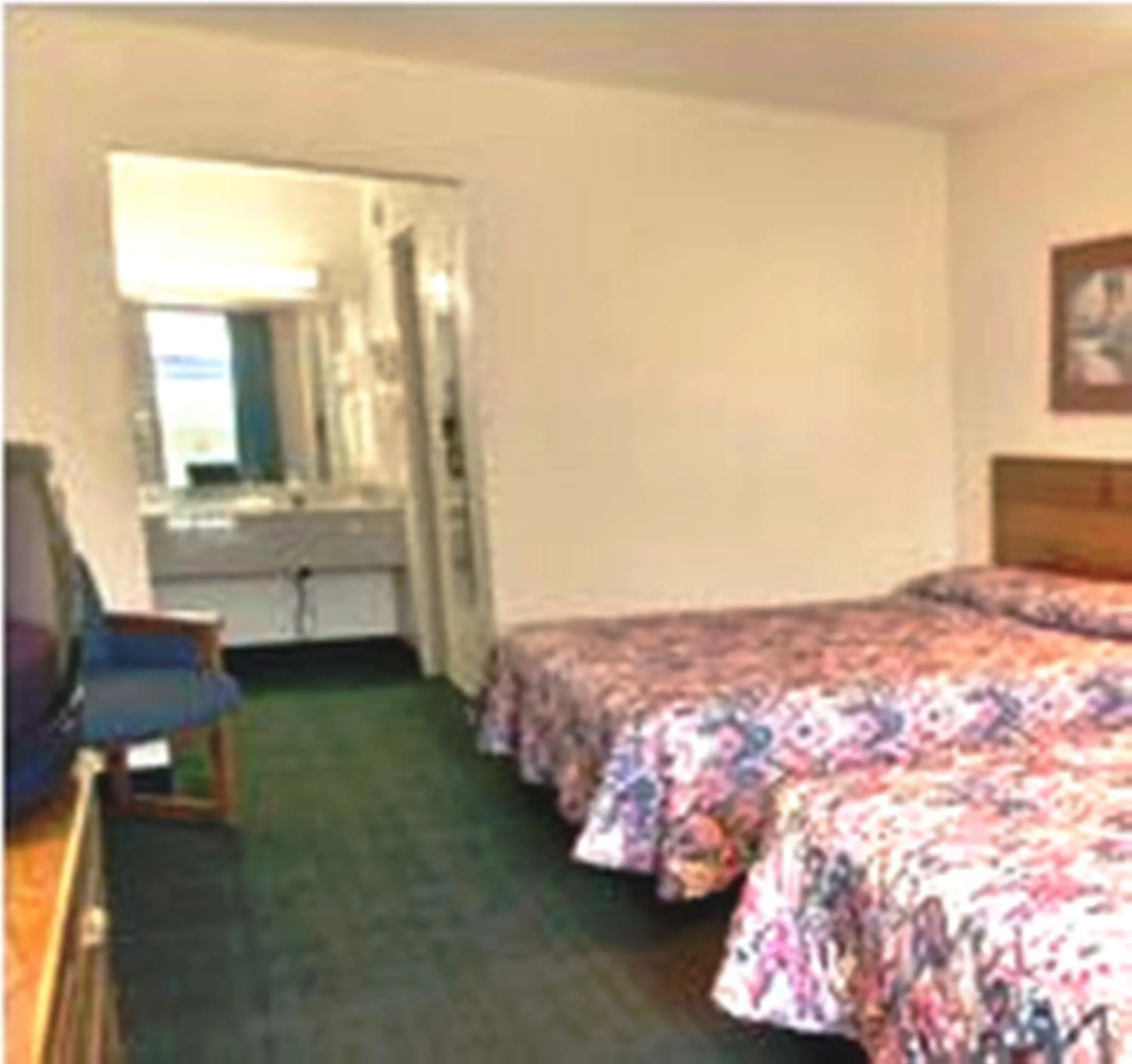 Queen Room with Two Queen Beds - Non-Smoking in Howard Johnson by Wyndham Commerce GA