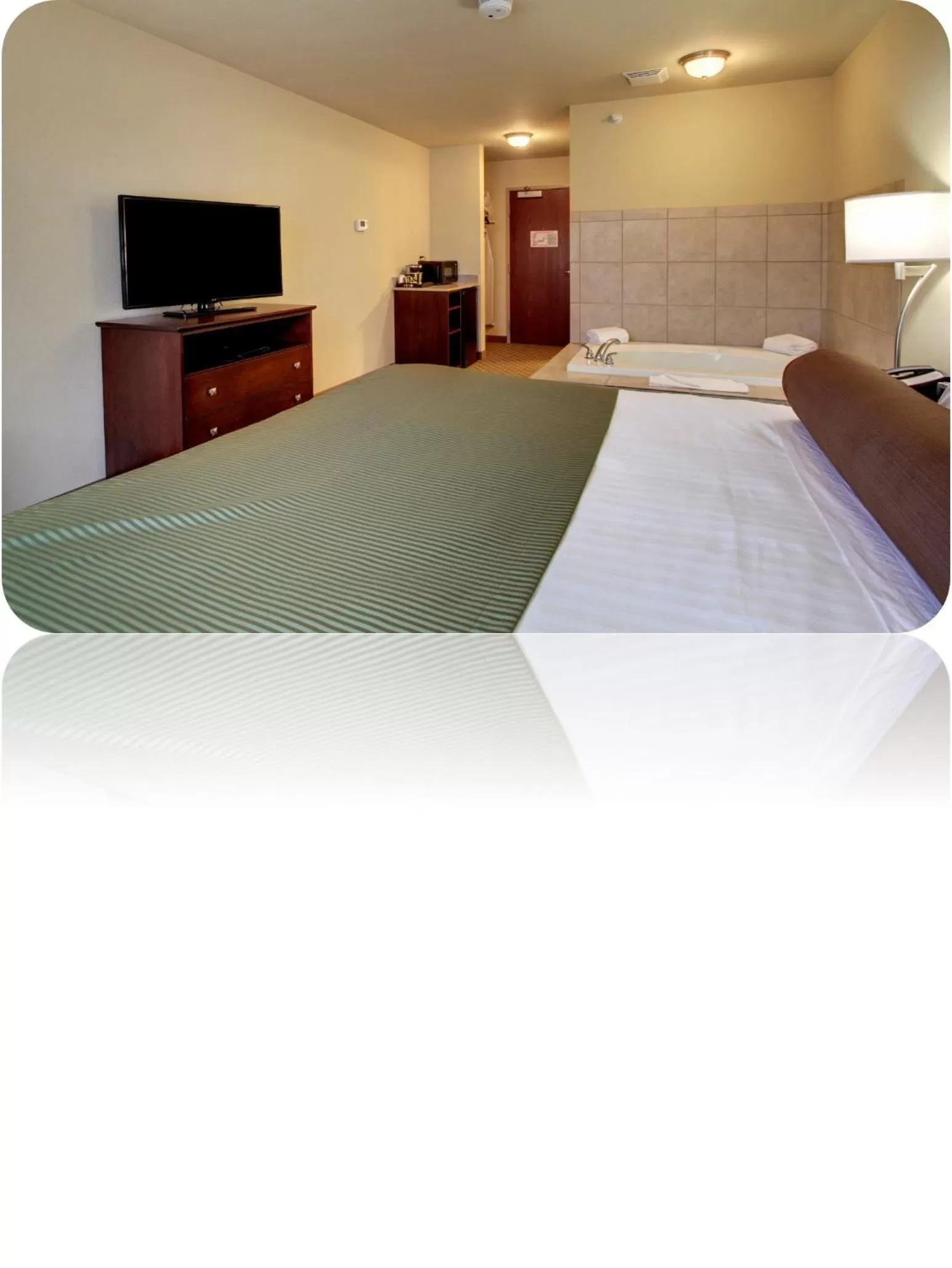 King Suite with Whirlpool in Cobblestone Inn & Suites - Harvey