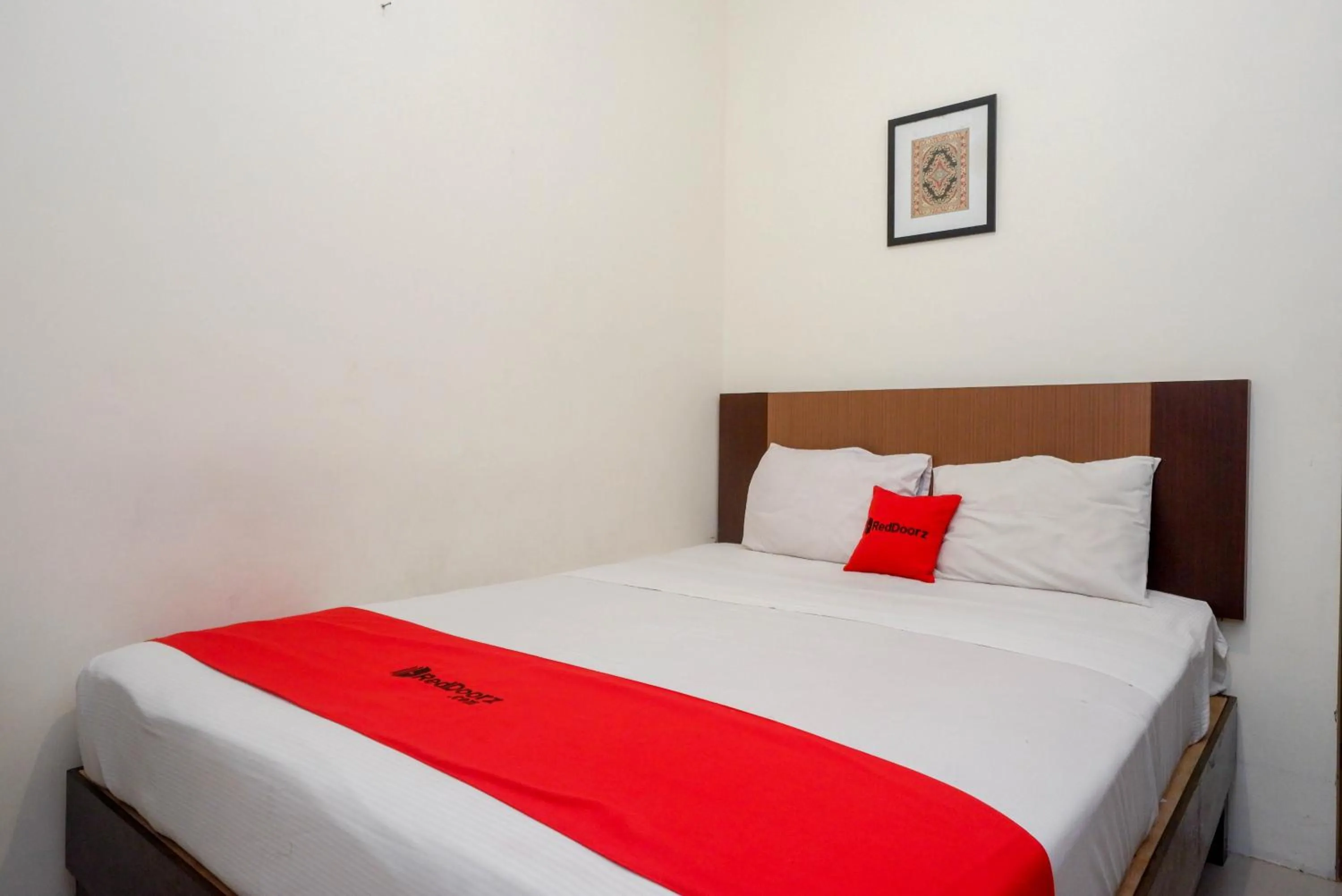 Standard Double Room in RedDoorz Syariah At Namira Hotel