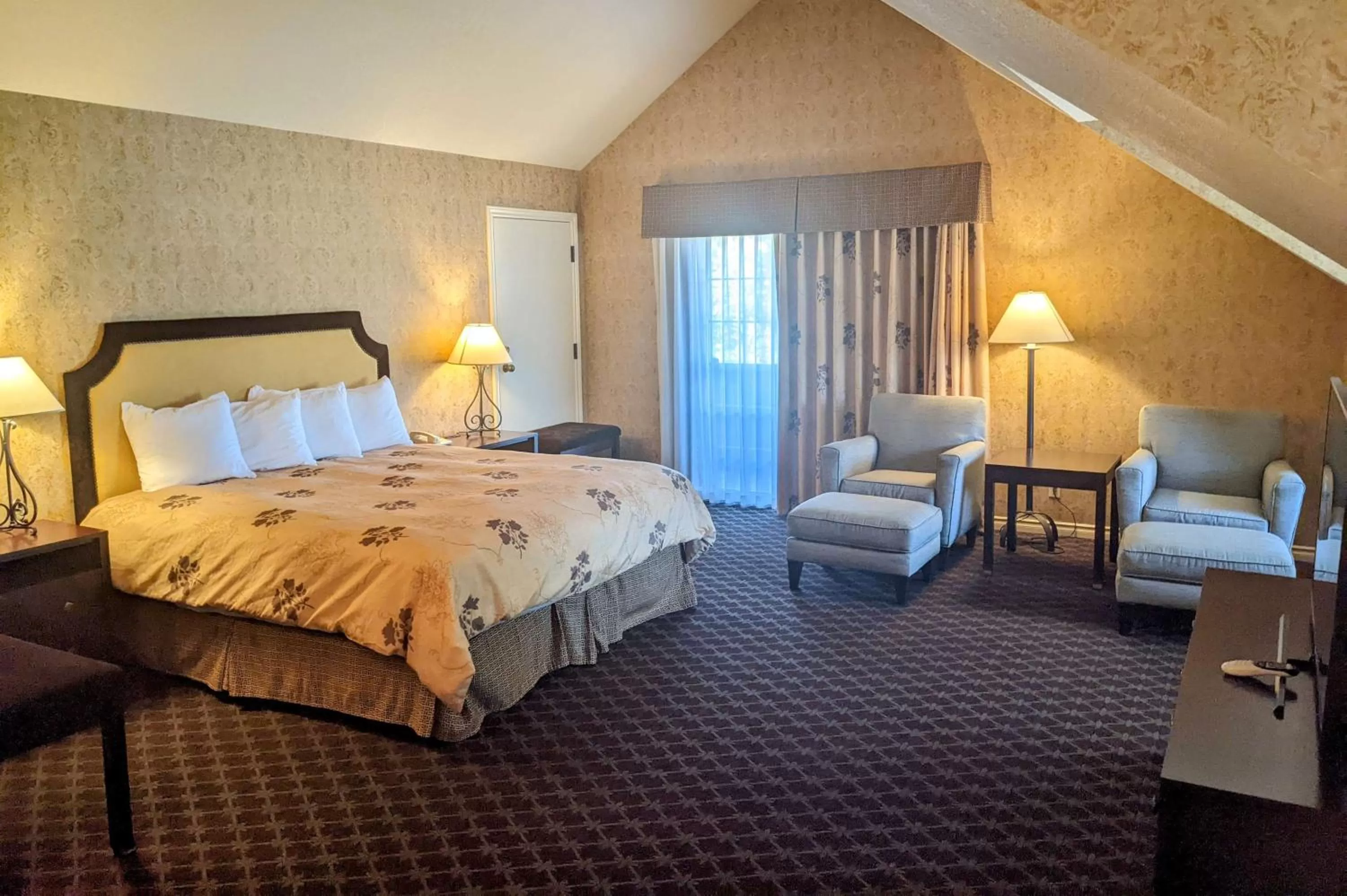 King Suite with Jetted Tub and Balcony in The Bard's Inn - BW Signature Collection by Best Western