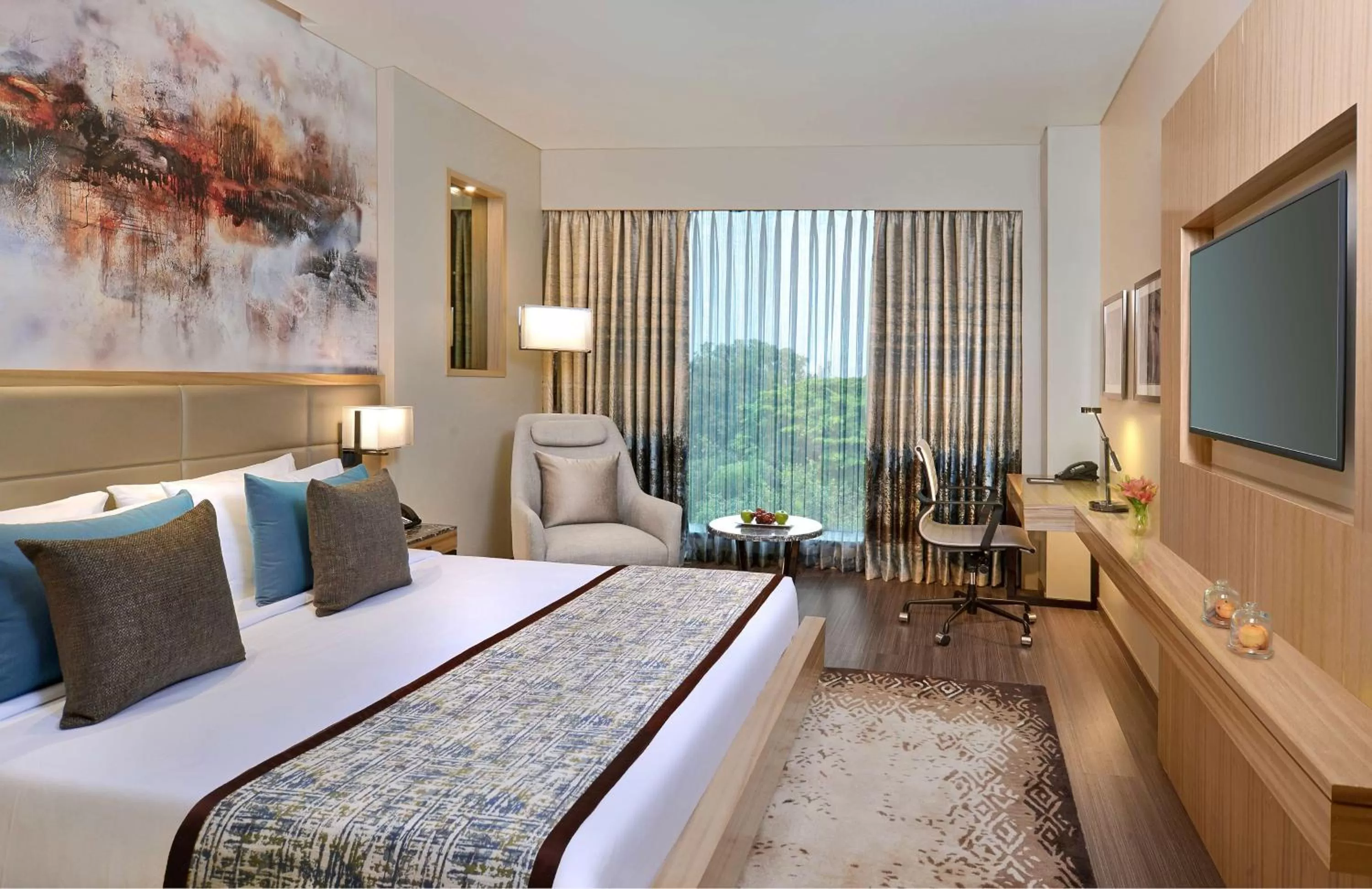 Deluxe Room - 10 percent off on food, beverages and spa, free snacks, soft drinks & fruit platter in Radisson Mumbai Andheri MIDC