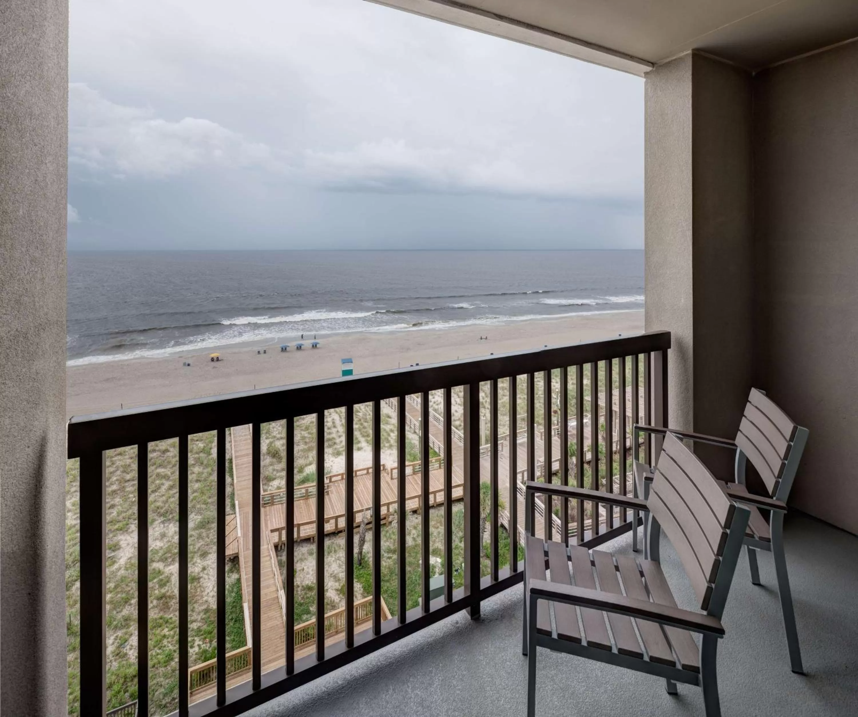 King Room with Balcony - Ocean Front/Hearing Accessible in Hampton Inn & Suites by Hilton Carolina Beach Oceanfront