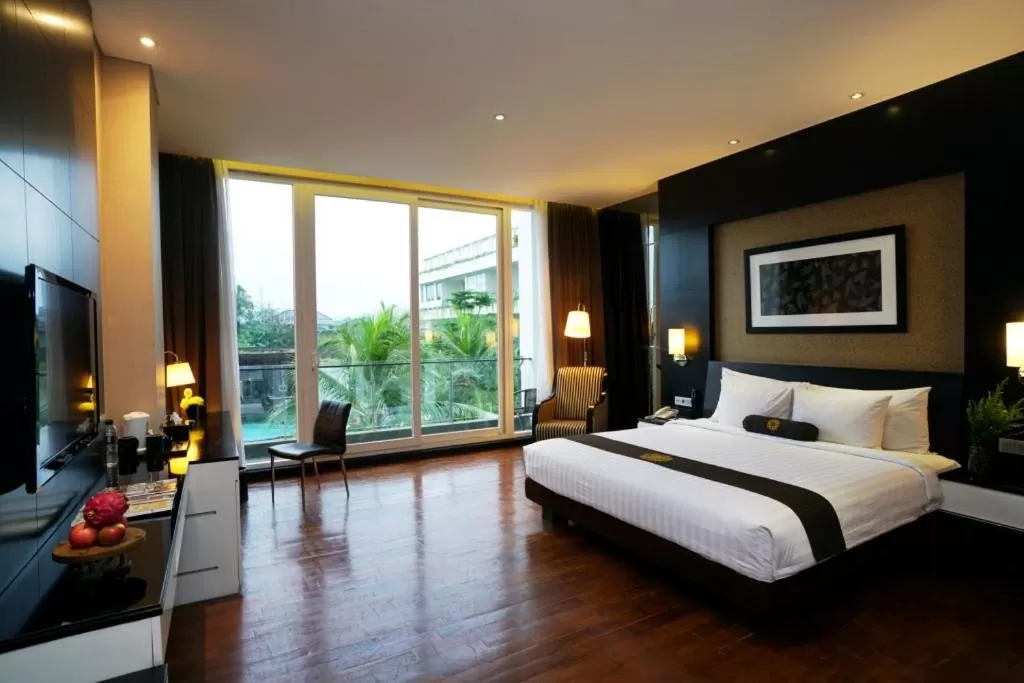 Premium Deluxe with Balcony in Java Heritage Hotel Purwokerto