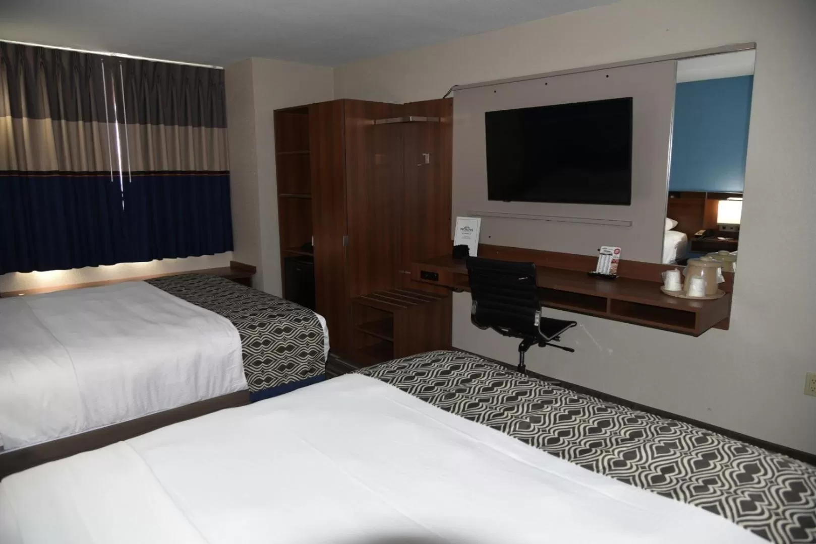 Queen Room with Two Queen Beds - Non-Smoking in Microtel Inn & Suites by Wyndham Fond Du Lac