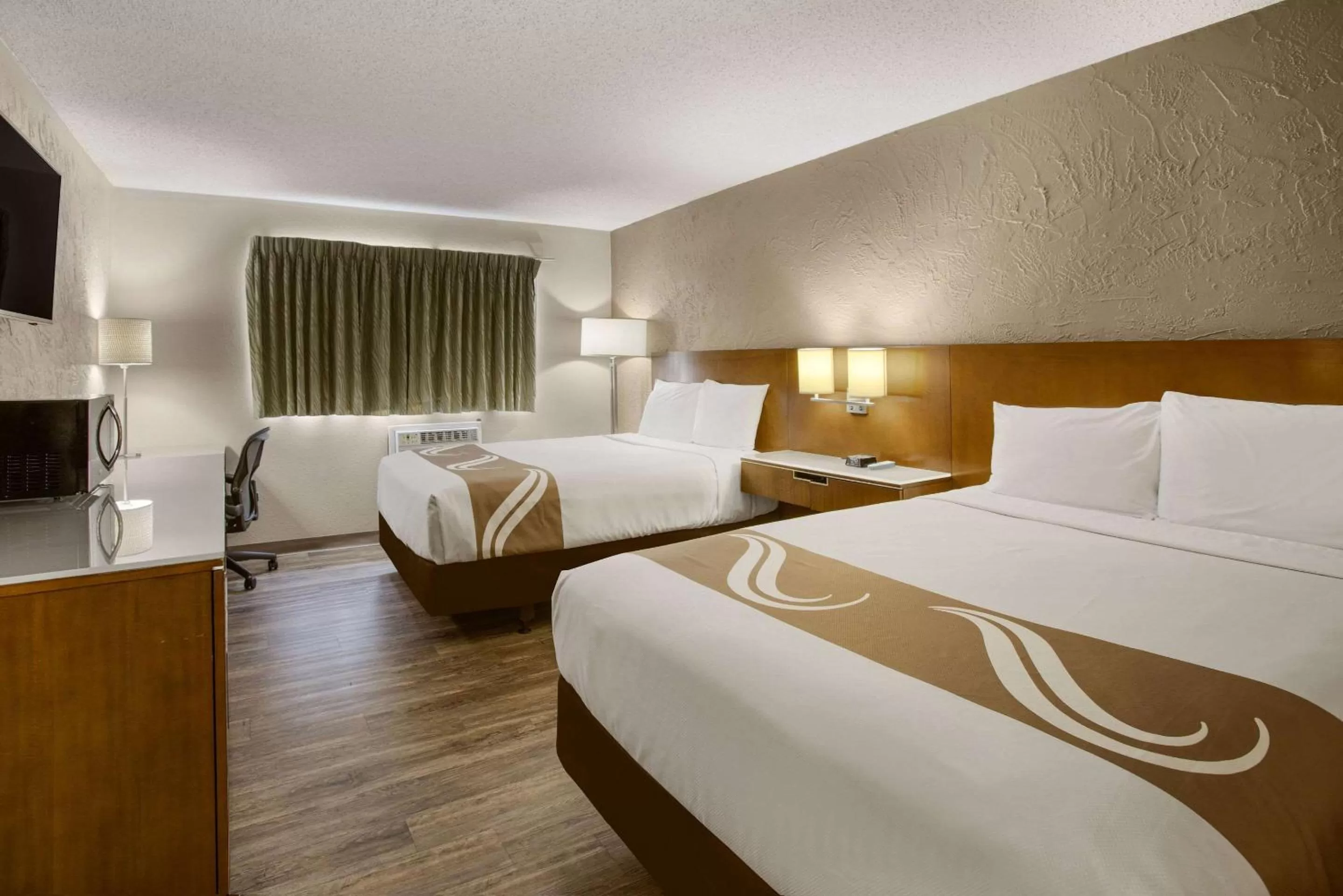 Standard Queen Room with Two Queen Beds - Non-Smoking in Rodeway Inn & Suites Grand Rapids Southeast