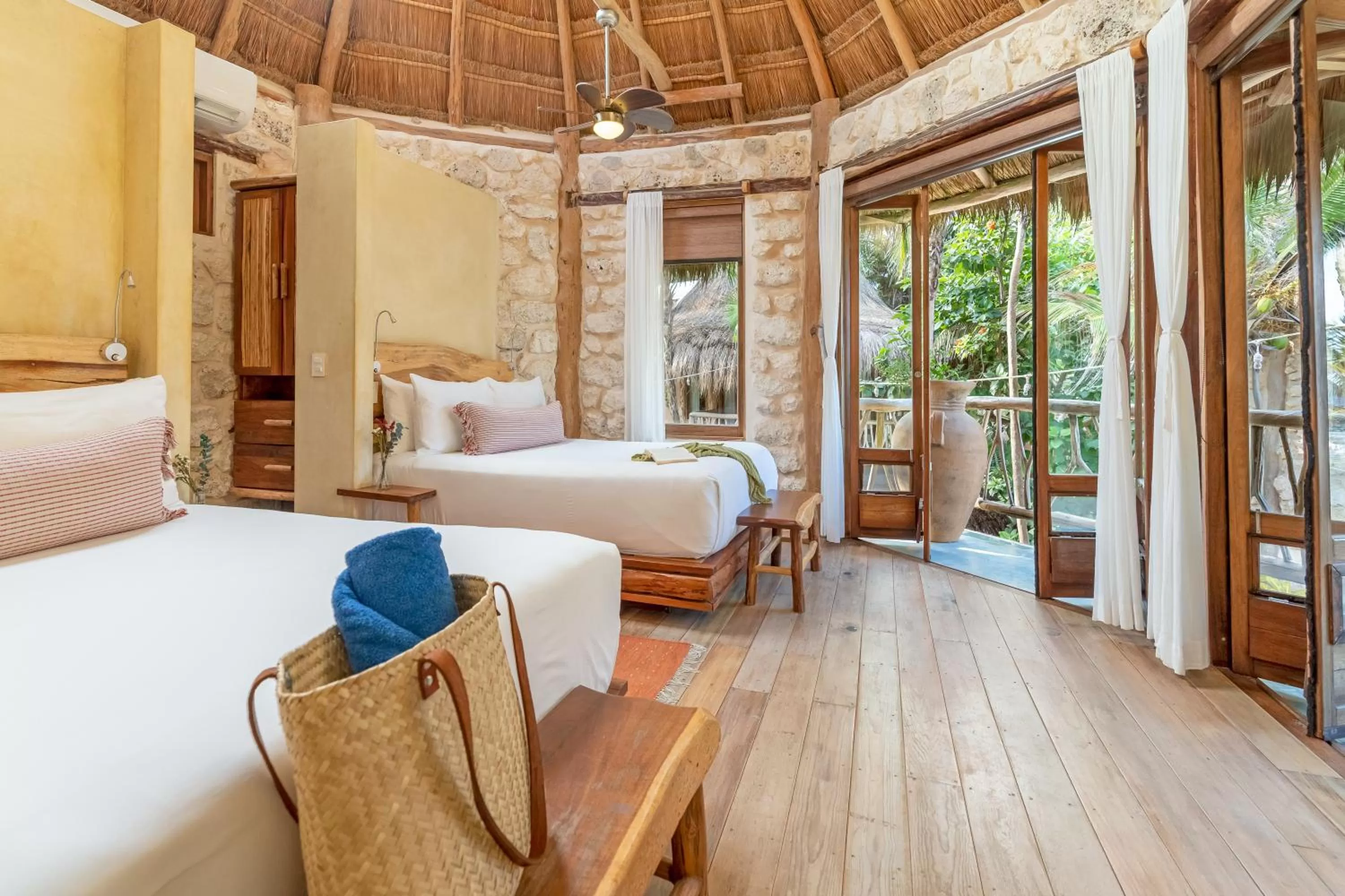 Partial Ocean View Deluxe Suite in Alaya Tulum by Ahau Collection