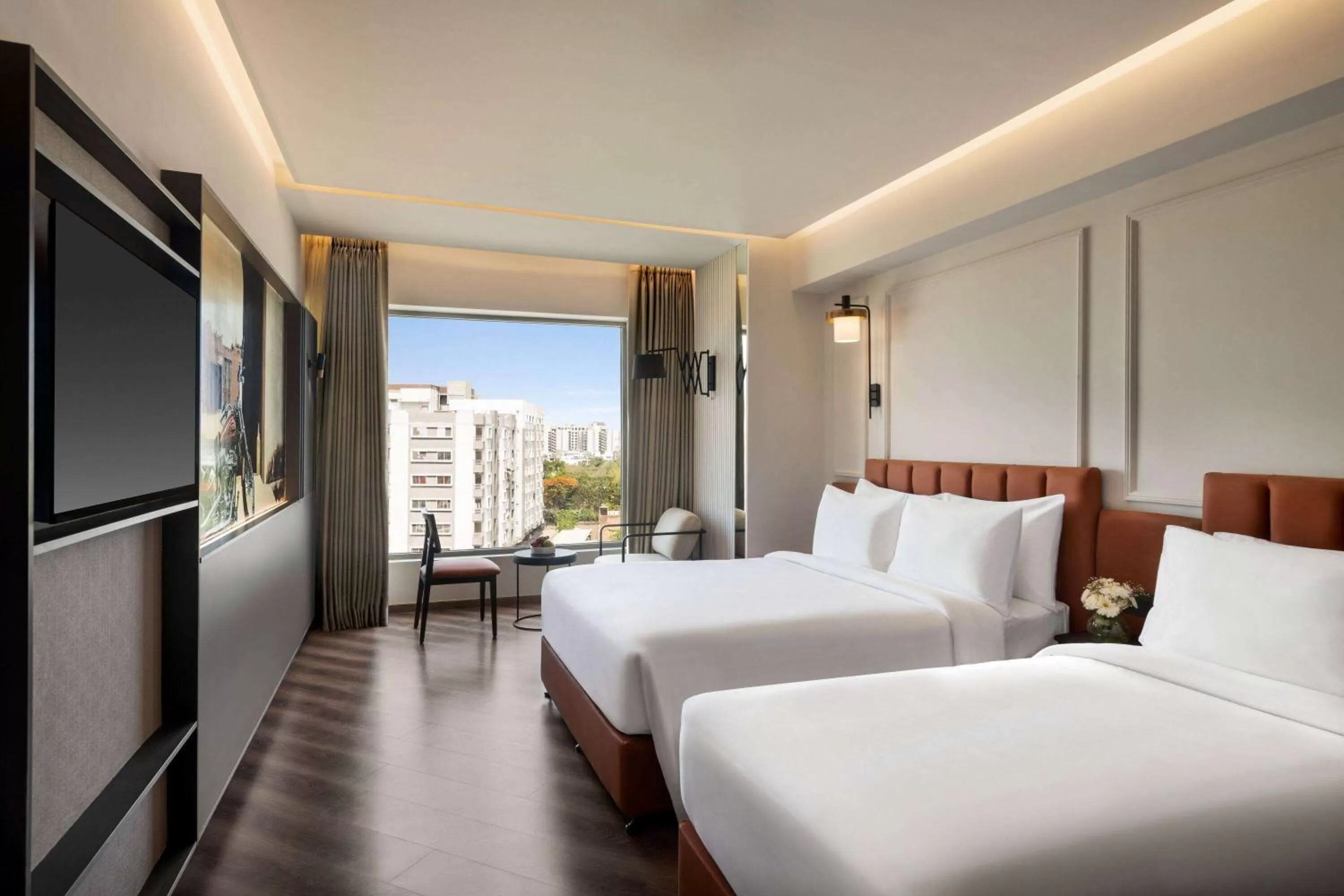 Hollywood Queen Room with Queen and Twin Bed in Ramada Encore by Wyndham Indore Nipania