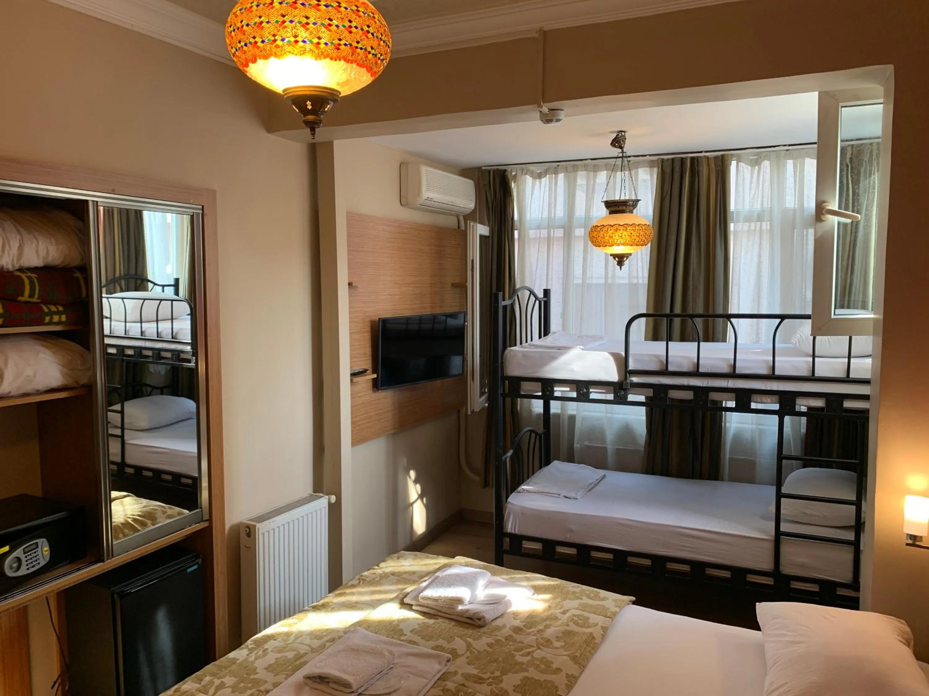Quadruple Room with Private Bathroom in Antique Hostel