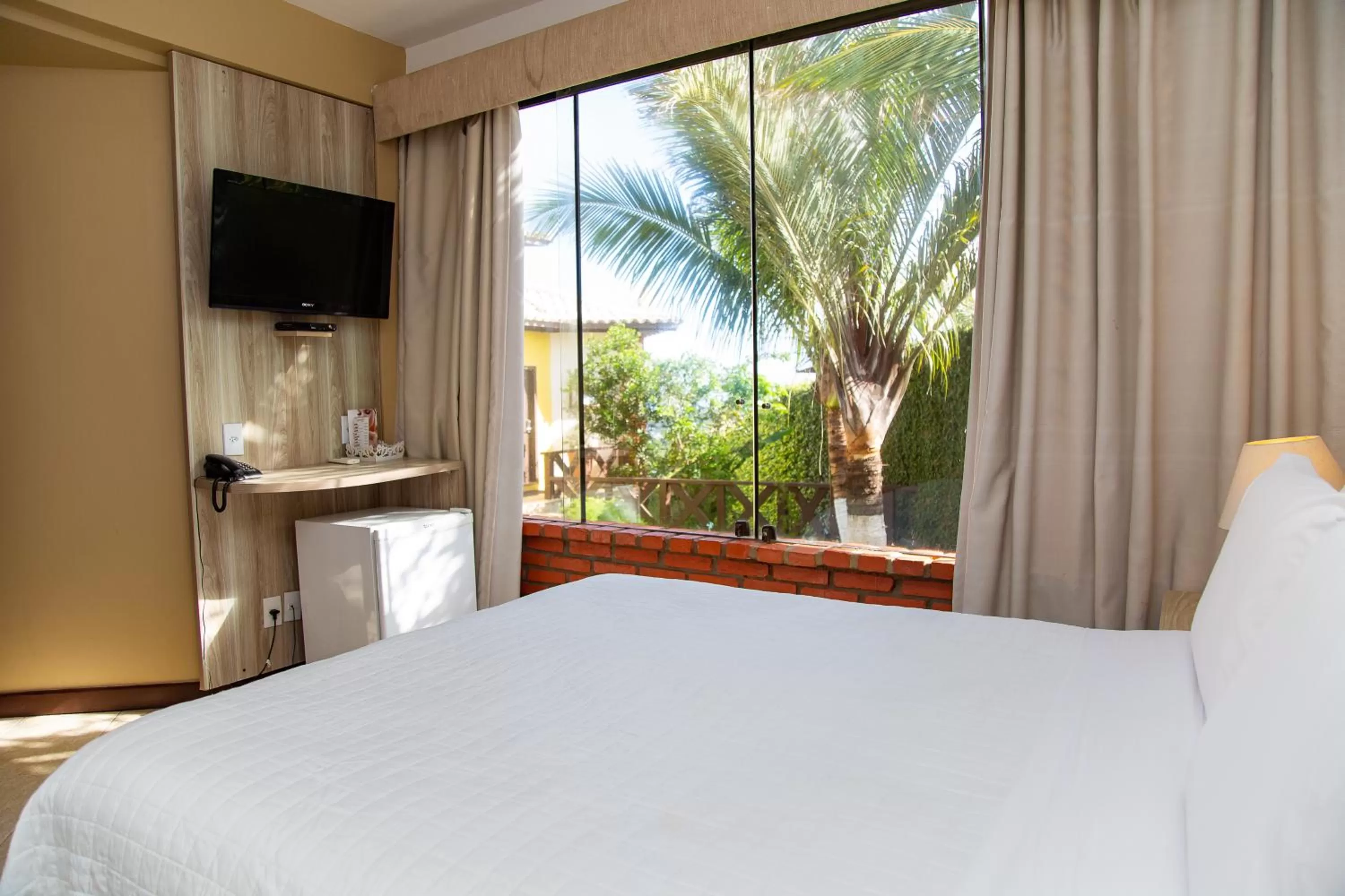 Bed in Costa do Sol Boutique Hotel