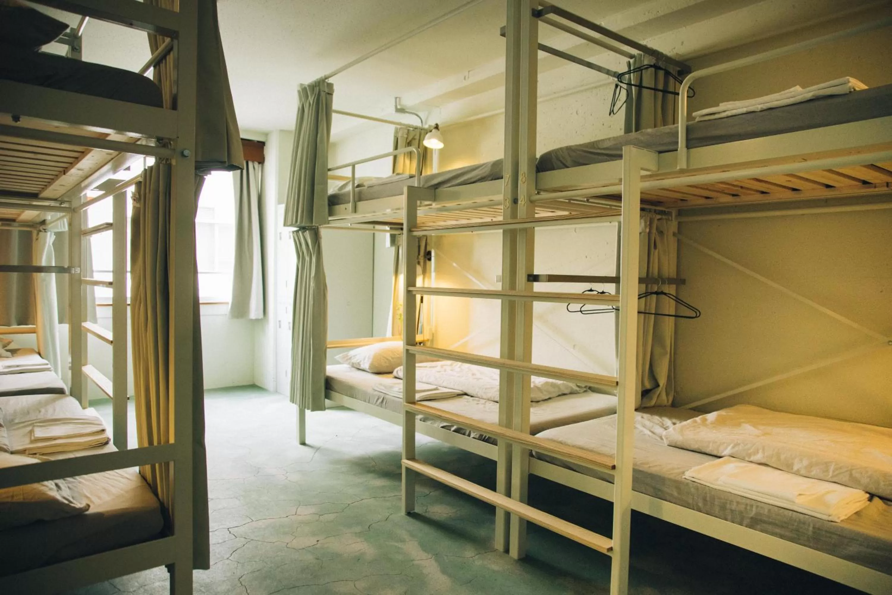 Bunk Bed in Mixed Dormitory Room for 8 people in Nui. HOSTEL & BAR LOUNGE