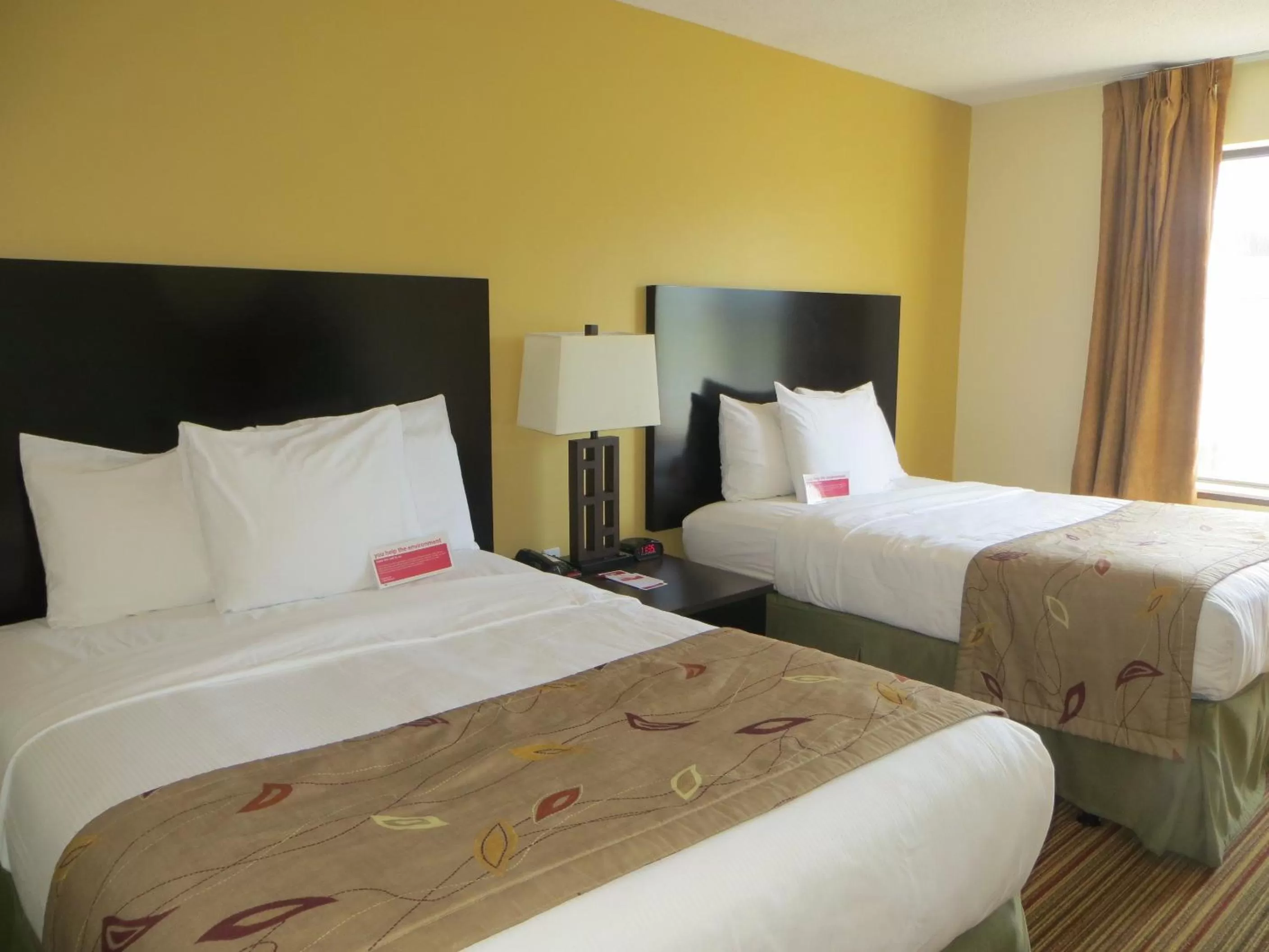 Deluxe Queen Room with Two Queen Beds - Non-Smoking in Ramada by Wyndham Wisconsin Dells I-90