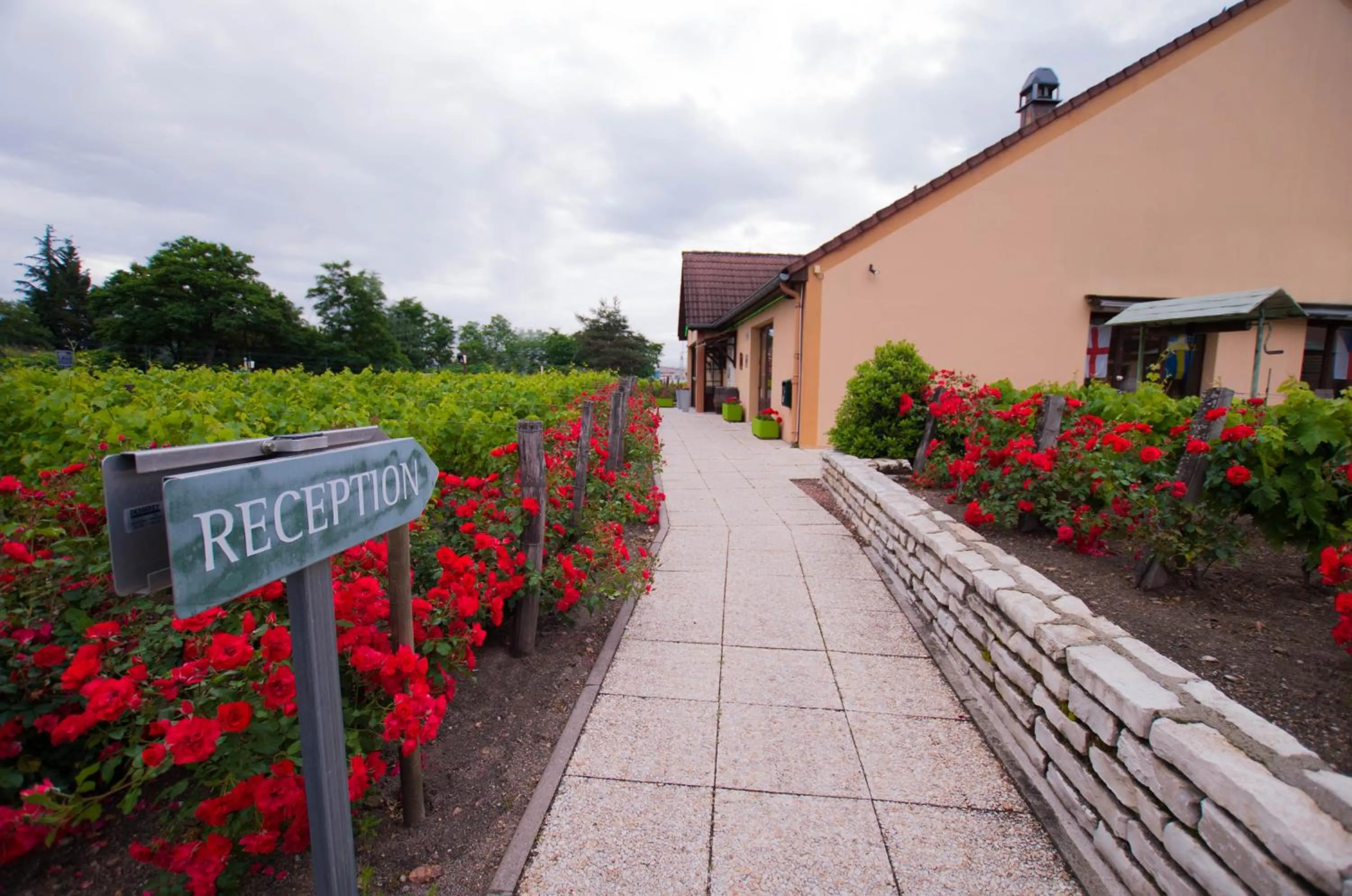 Property building in Kyriad Direct Roanne Hôtel