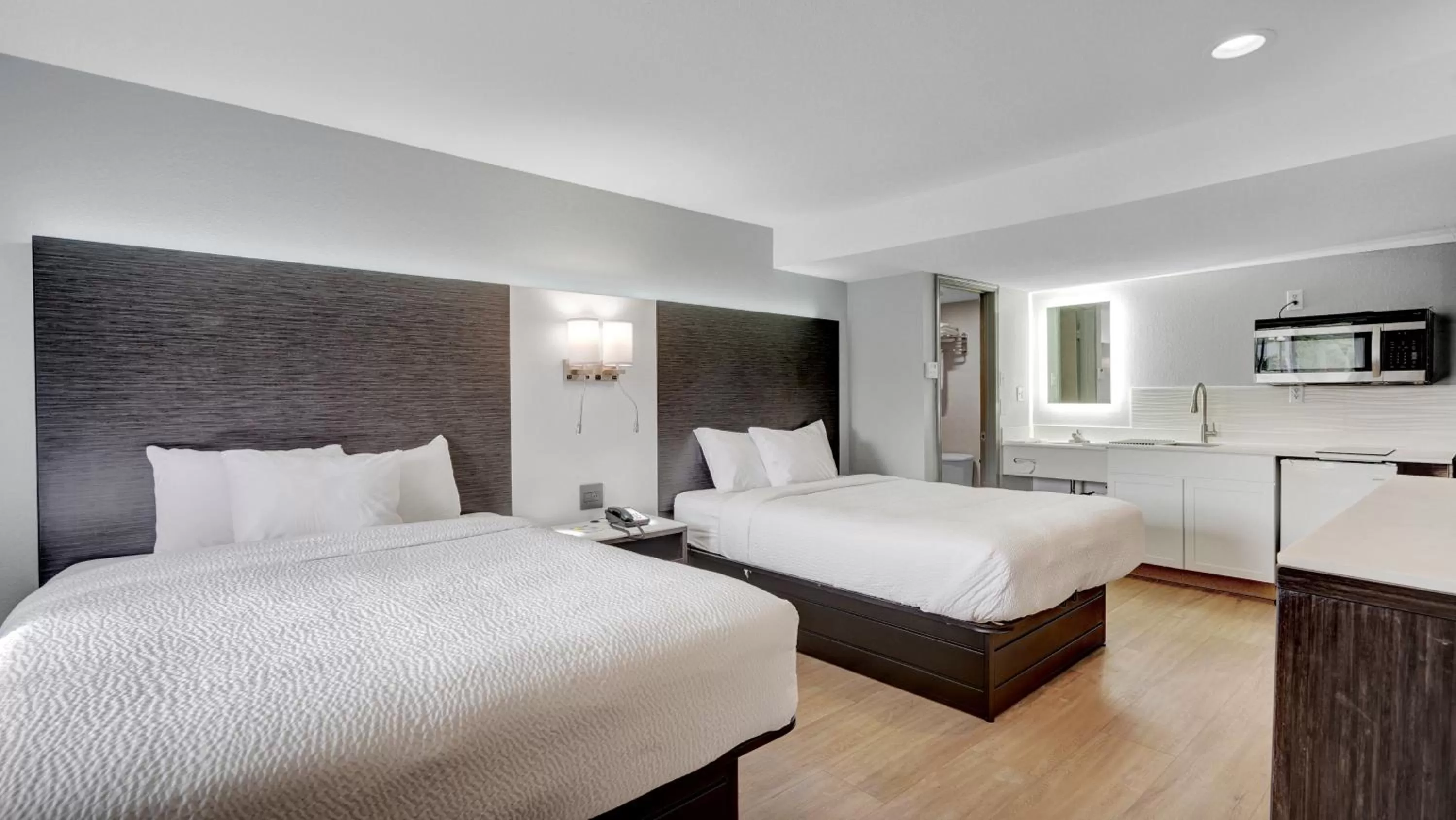 Deluxe Queen Room with Two Queen Beds - Non-Smoking in Days Inn & Suites by Wyndham Niagara Falls/Buffalo