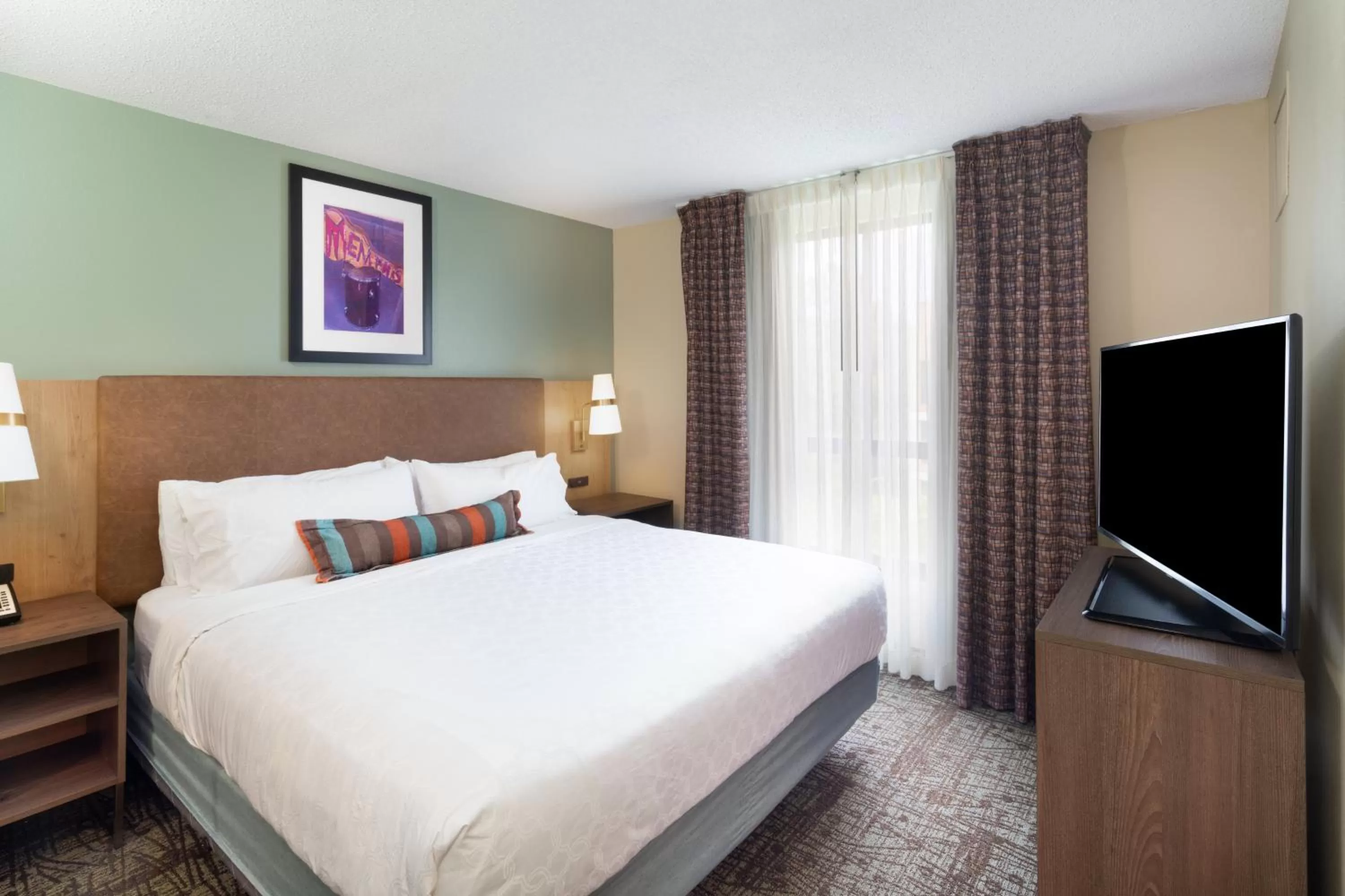 One-Bedroom King Suite with Communications Accessible Roll-In Shower in Staybridge Suites Memphis-Poplar Ave East by IHG