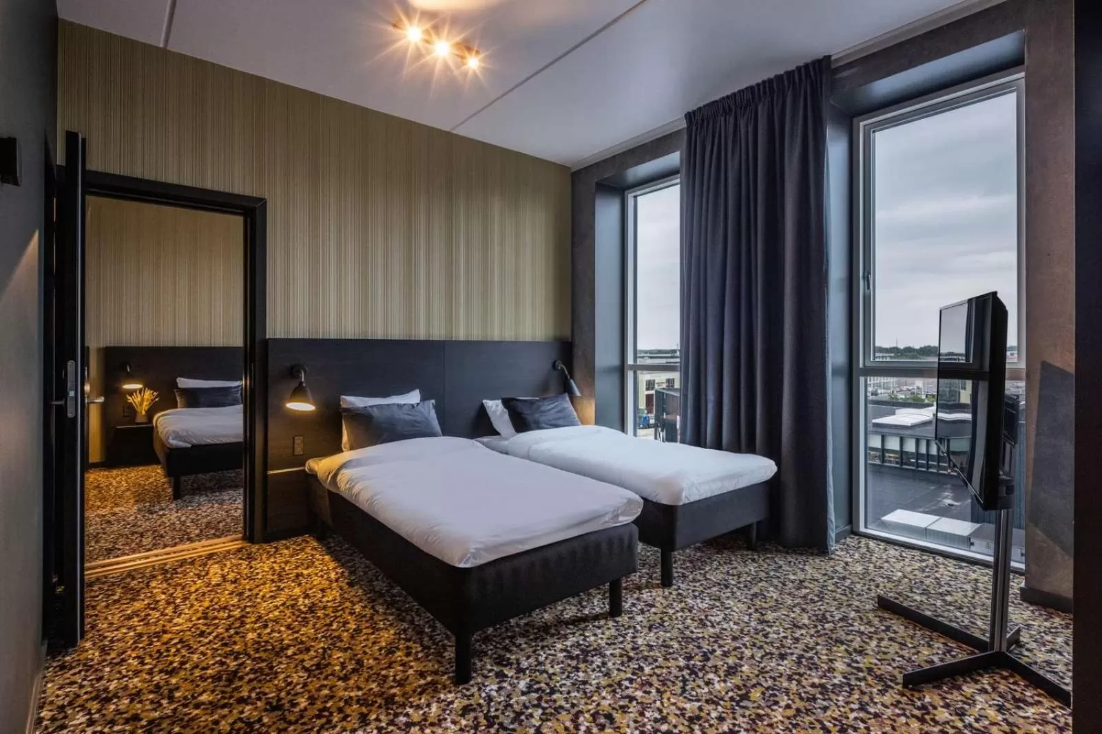 Family Room with Balcony in Peak 12 Hotel