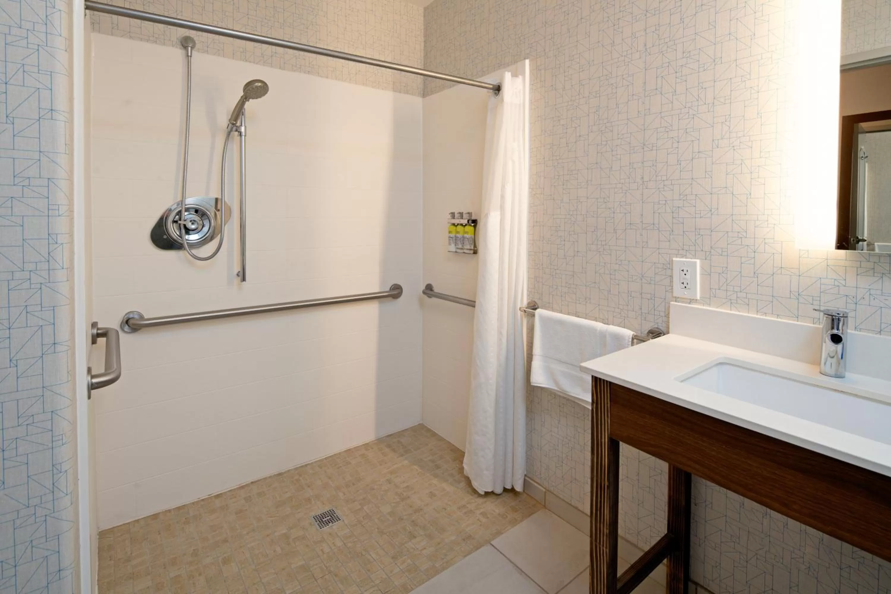 Standard Queen Room with Two Queen Beds and Mobility Accessible Roll-In Shower in Holiday Inn Express Fresno South by IHG