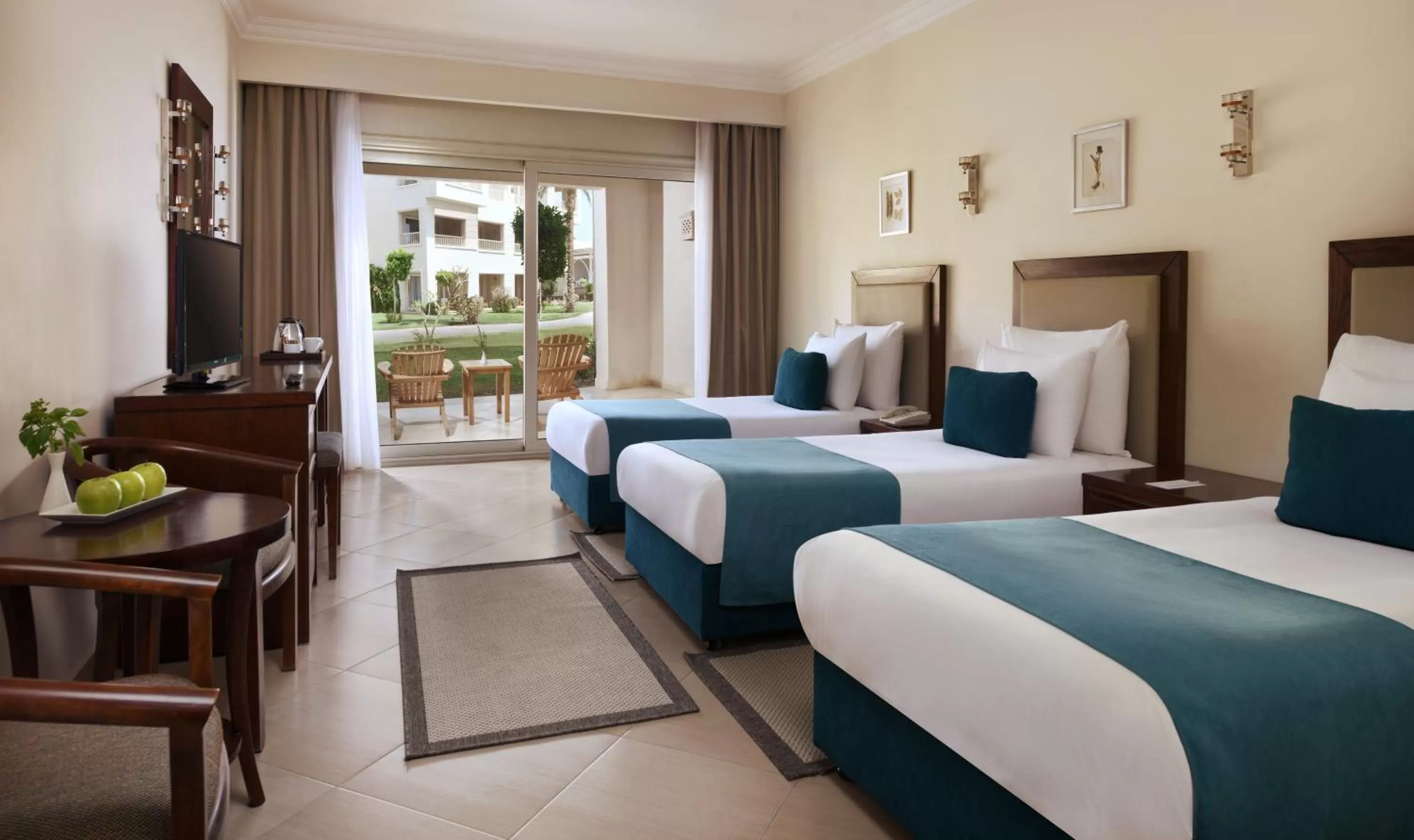 Superior Triple with Garden View in Jaz Soma Beach