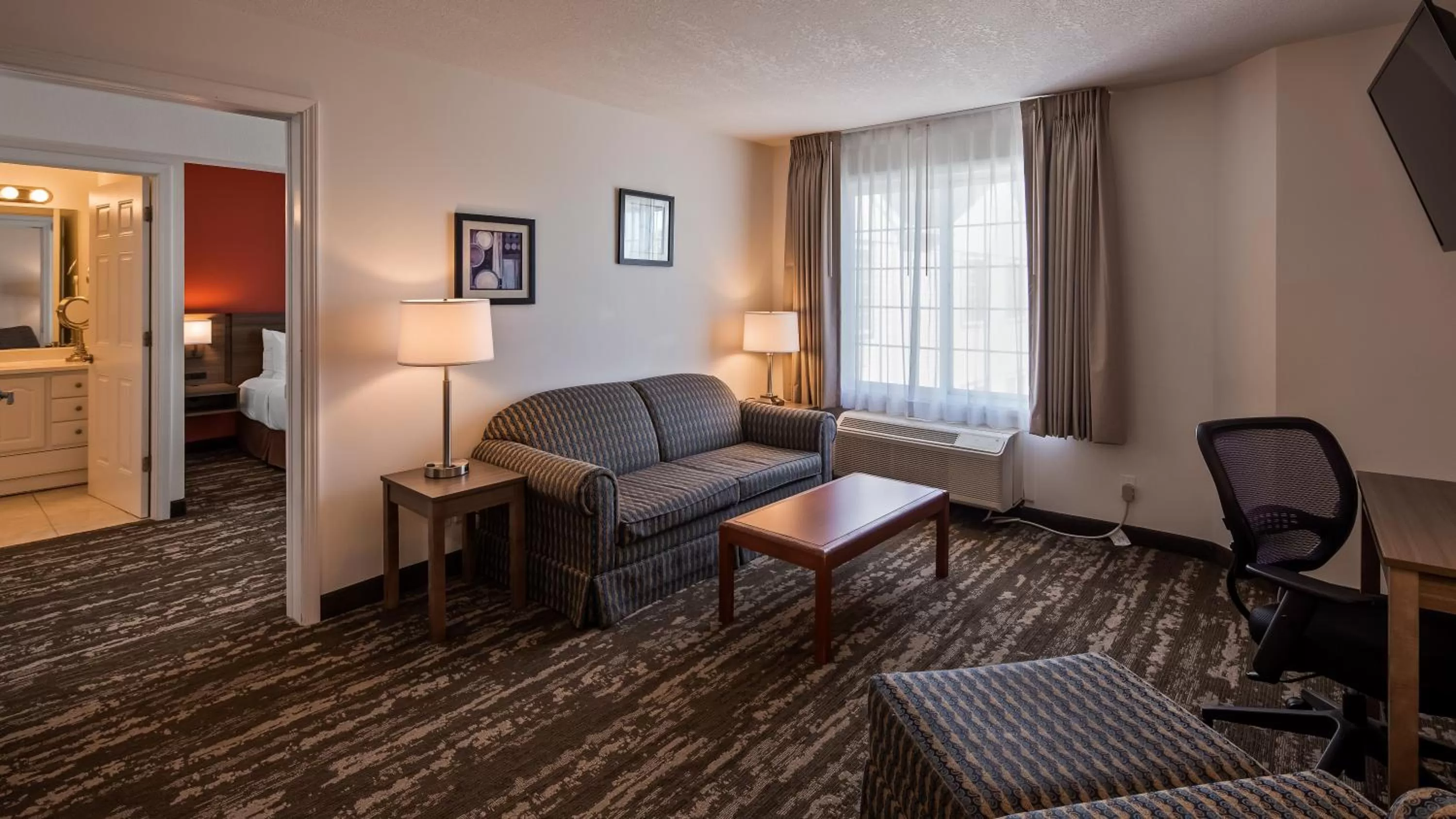 Queen Suite with Sofa Bed and Courtyard View - Non-Smoking in Charlevoix Inn & Suites SureStay Collection by Best Western