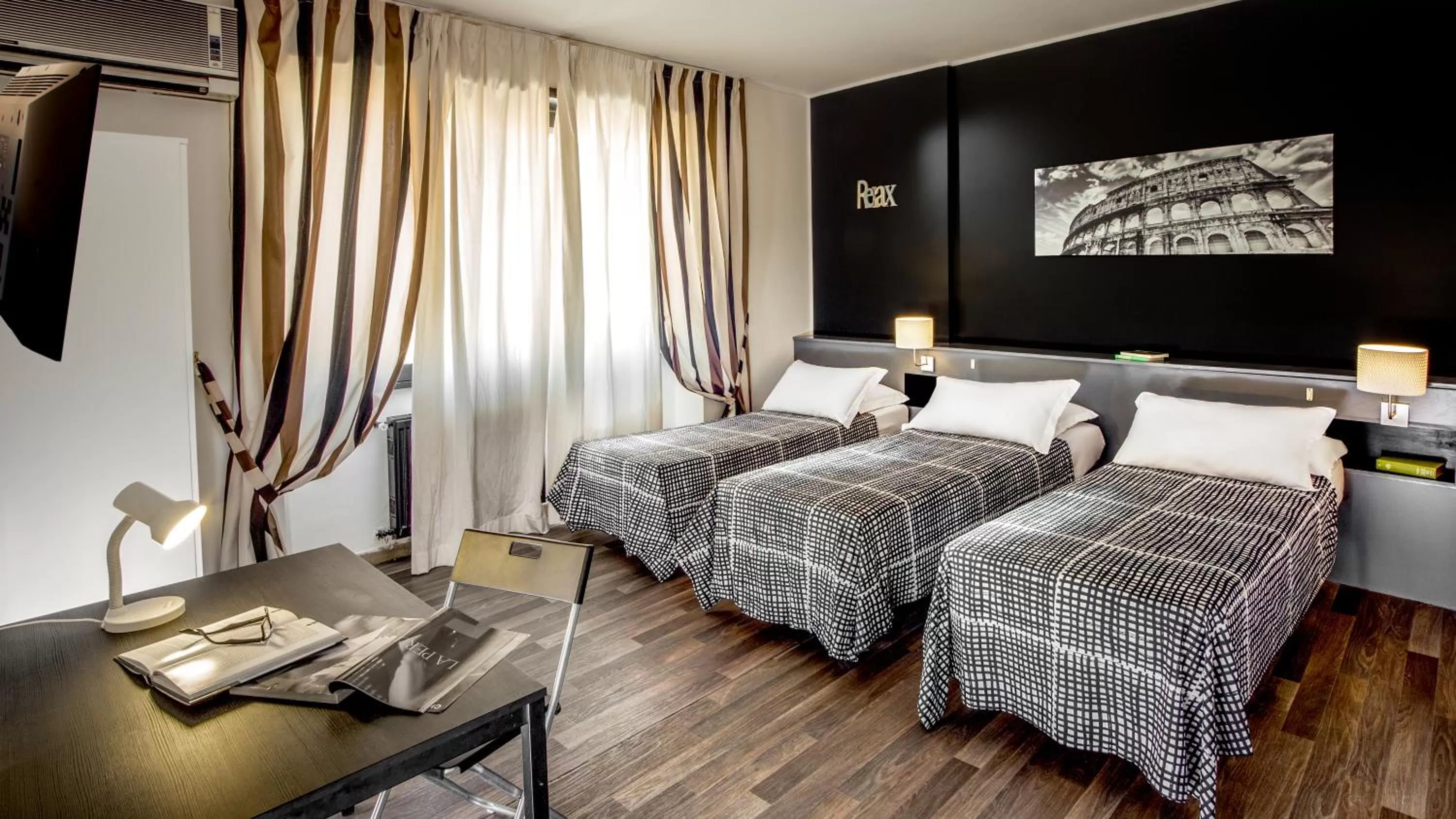 Comfort Quadruple Room in Radio Hotel