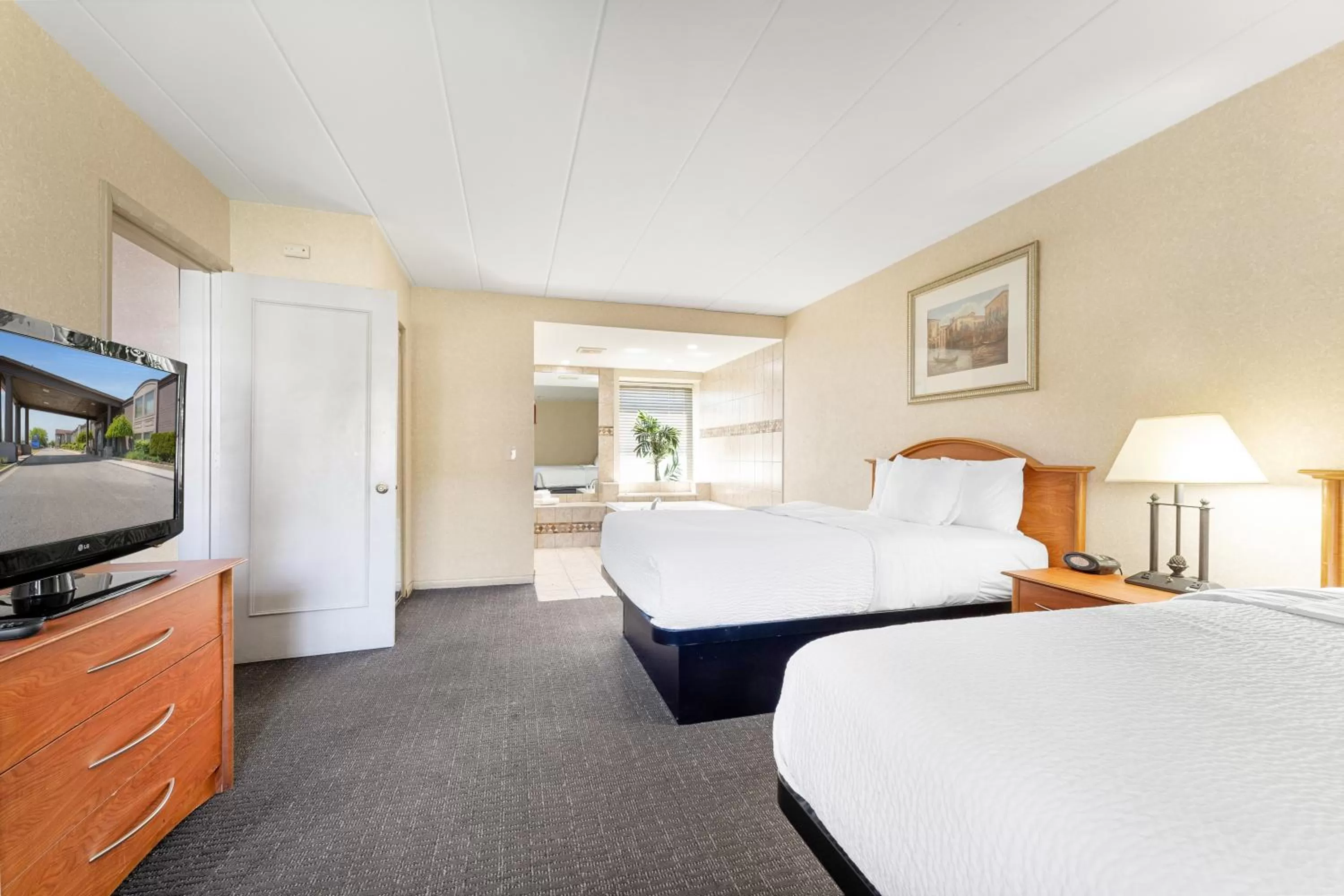 Deluxe Double Suite with Two Double Beds - Non-Smoking in Days Inn & Suites by Wyndham Roseville/Detroit Area