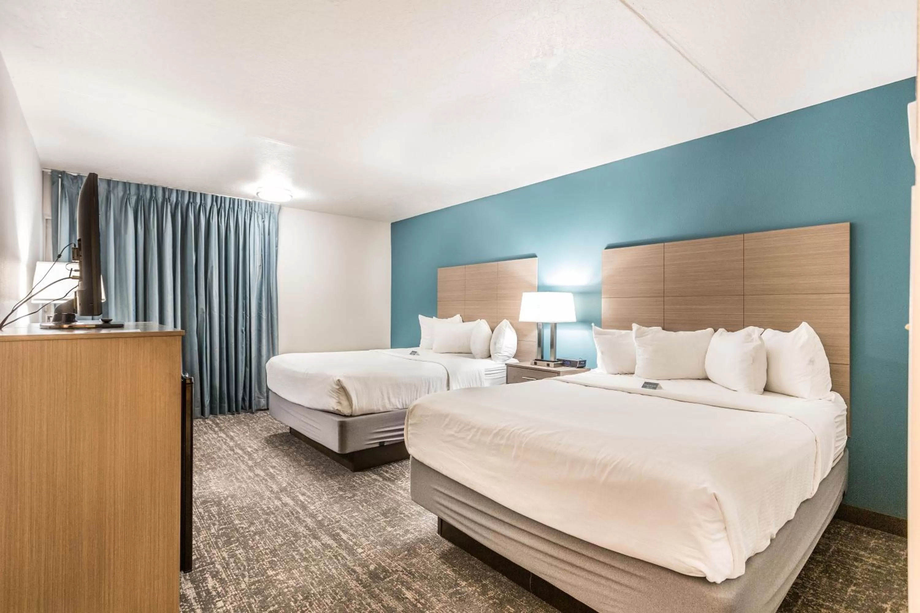 Queen Room with Two Queen Beds - Pool Side in EverSpring Inn and Suites