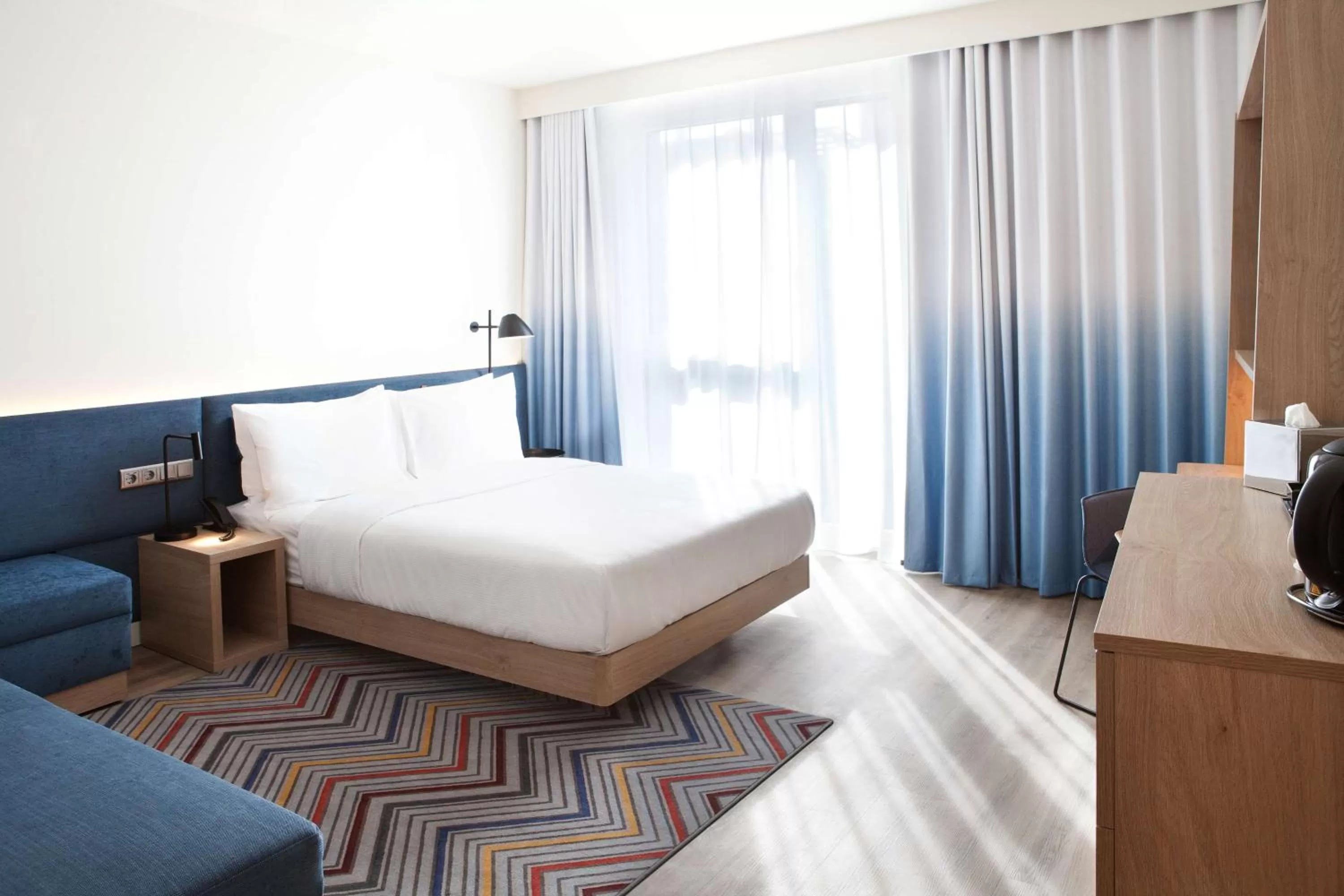 Queen Room with Sofa Bed and City View in Hampton By Hilton Vienna Messe
