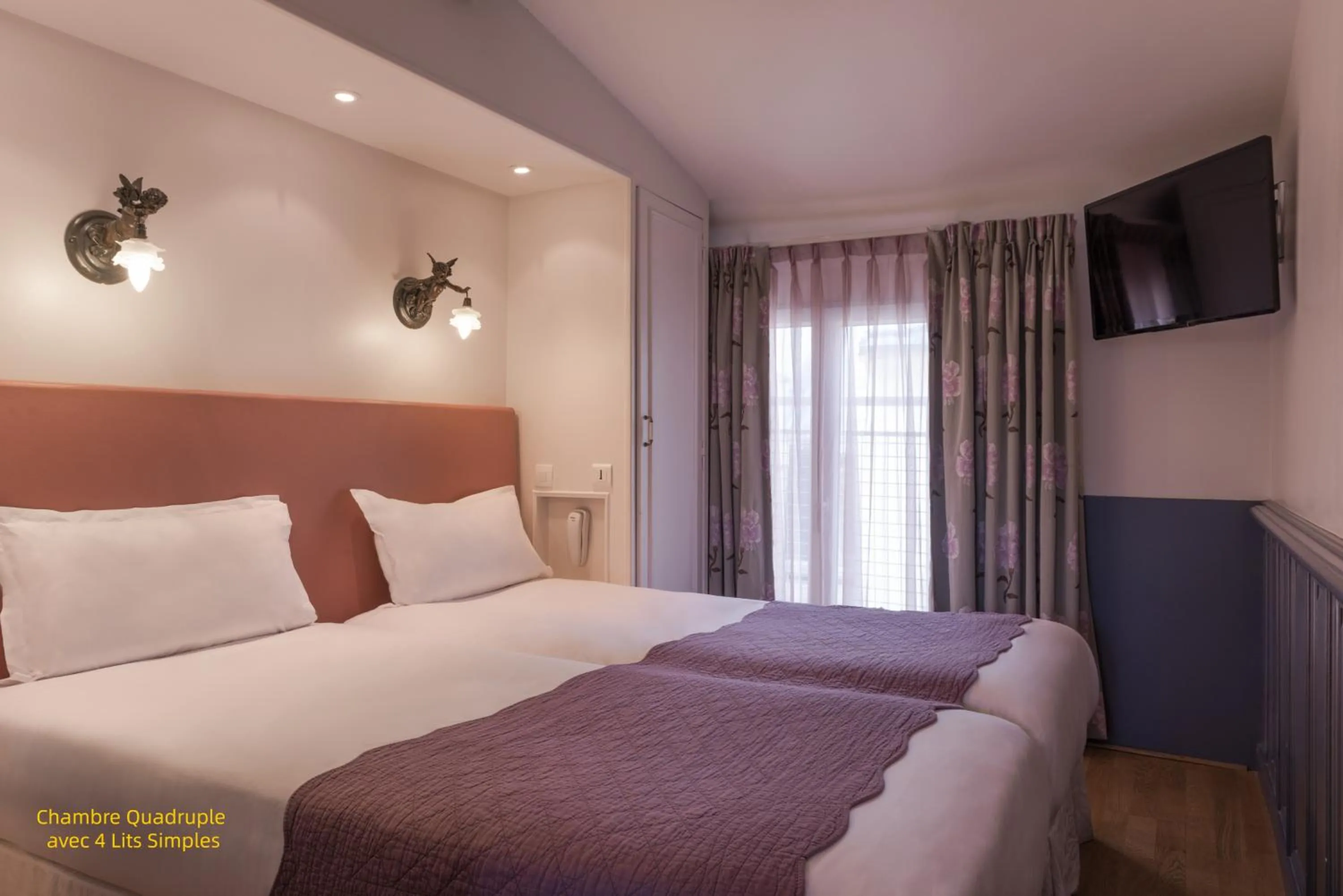 Quadruple Room with four single beds in Hôtel Gaillon Opera