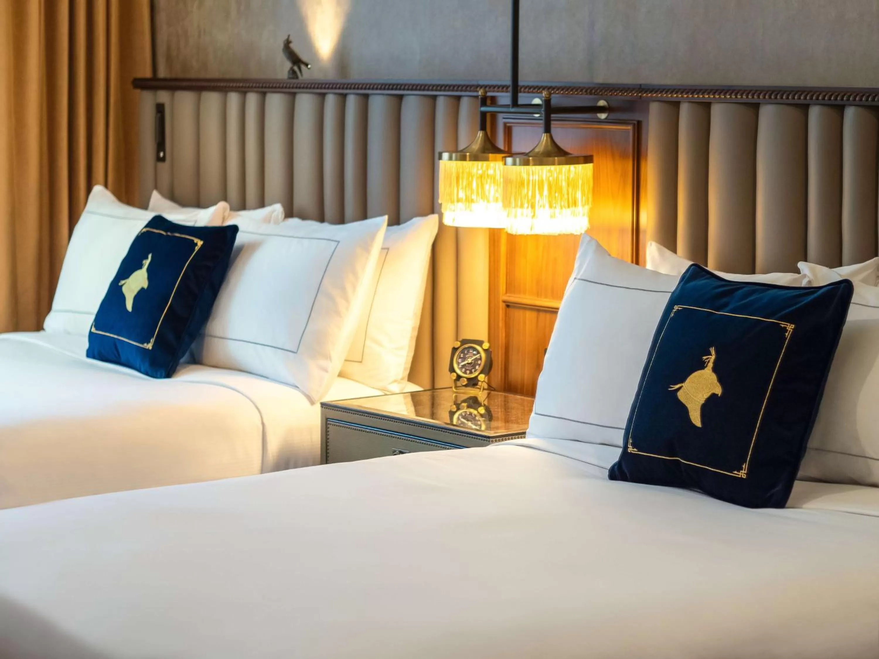 Queen Room with Two Queen Beds - Hearing Access in The Peregrine Omaha Downtown Curio Collection By Hilton