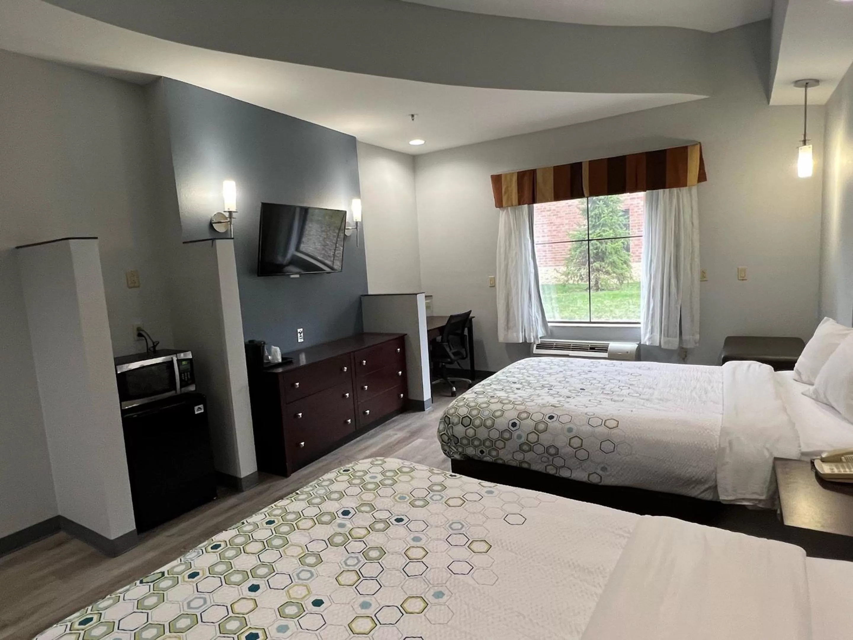Suite with One King Bed and One Double Bed with Kitchenette Non-Smoking in HomeTowne Studios & Suites by Red Roof Washington