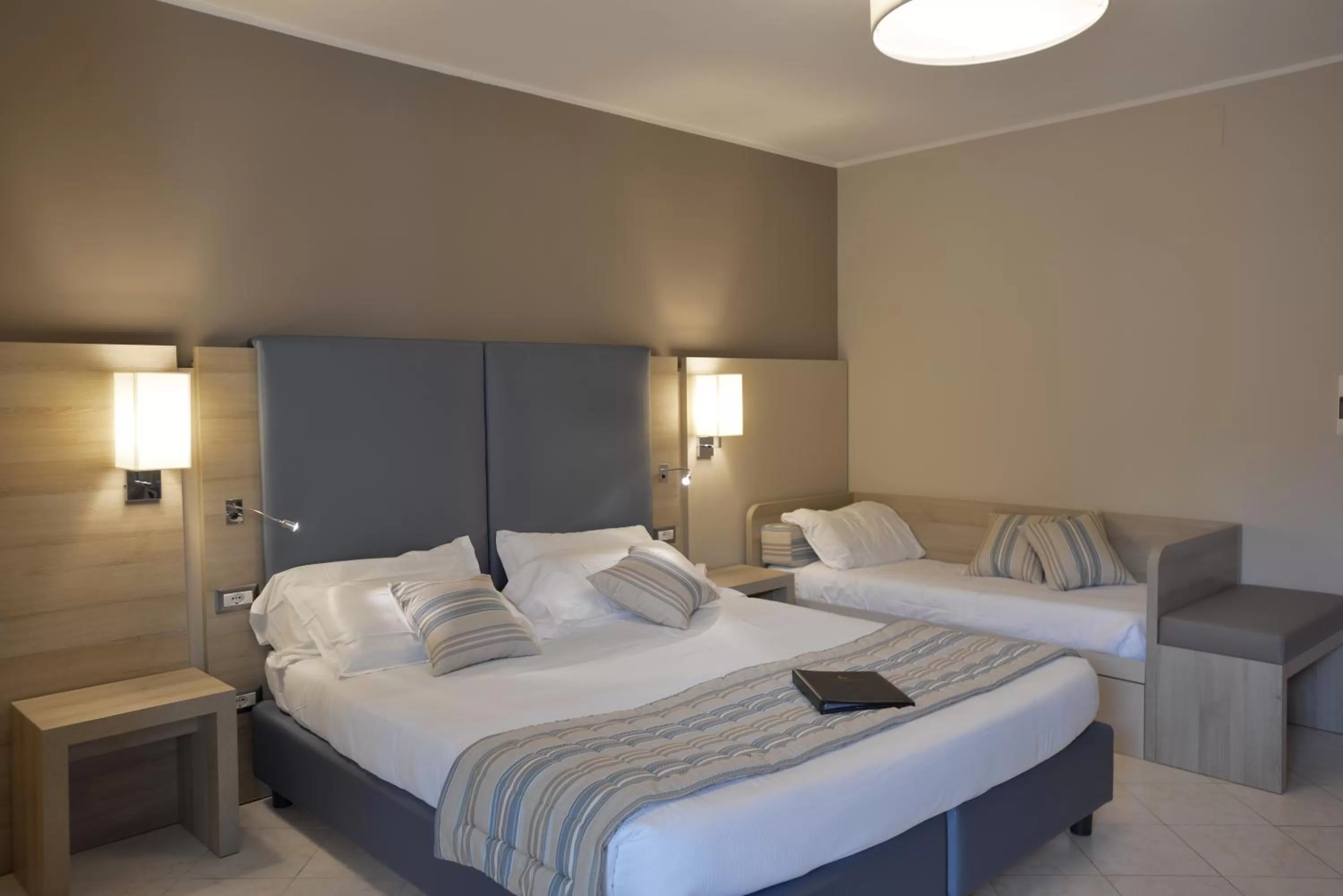 Standard Quadruple Room in Alma di Alghero Hotel