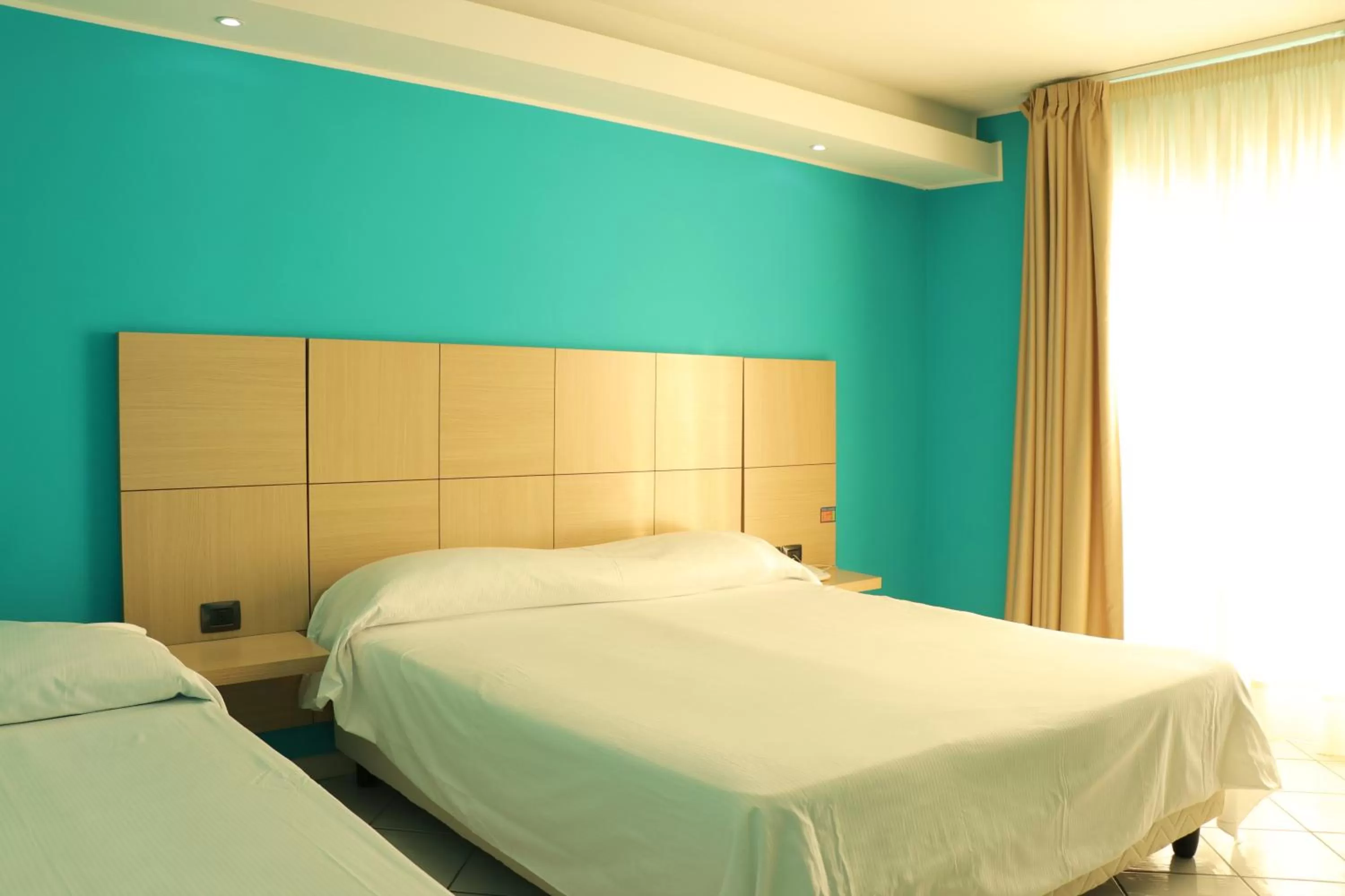 Superior Triple Room with Sea View in Hotel Ancora