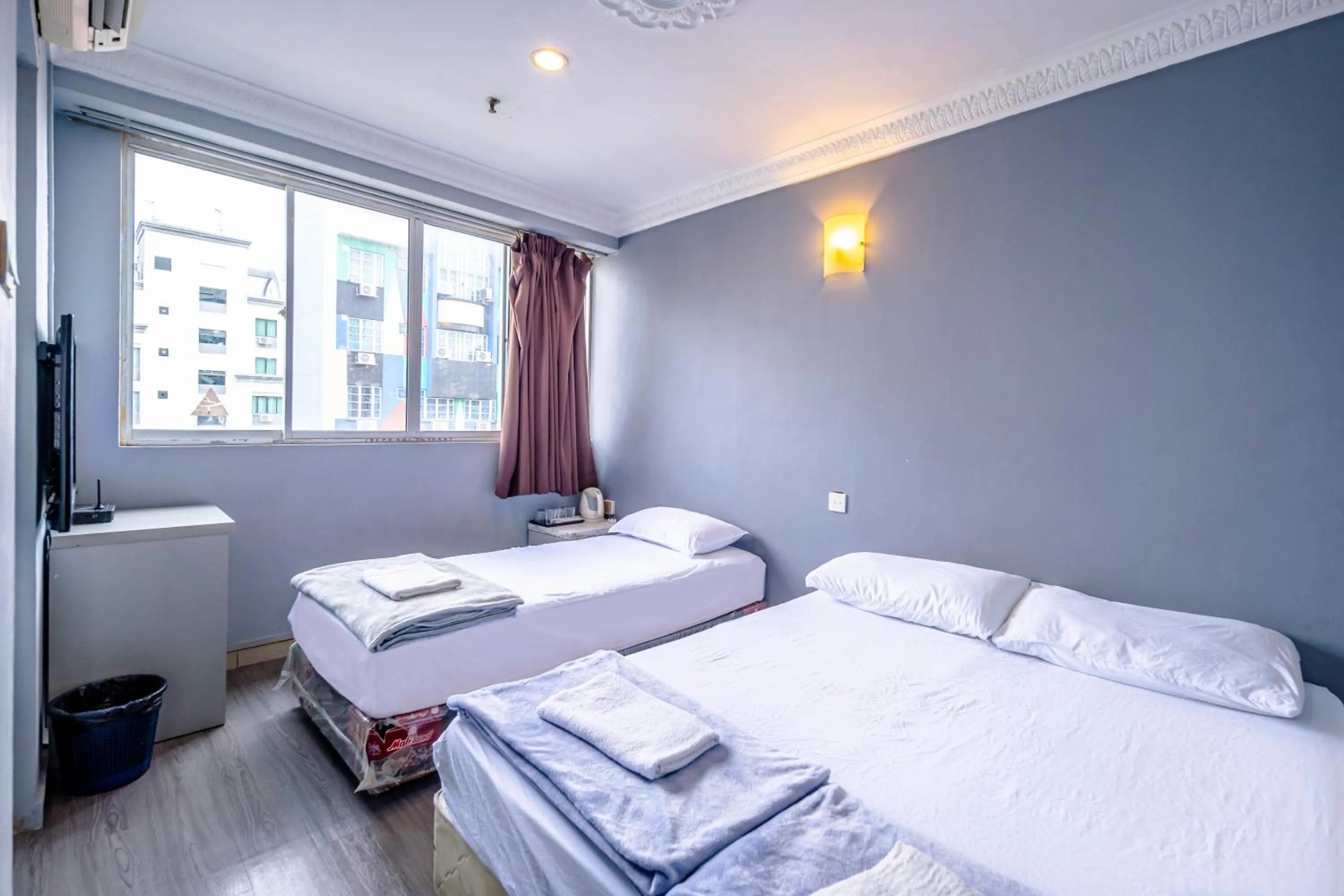 Grand Triple Room in K Hotel 12