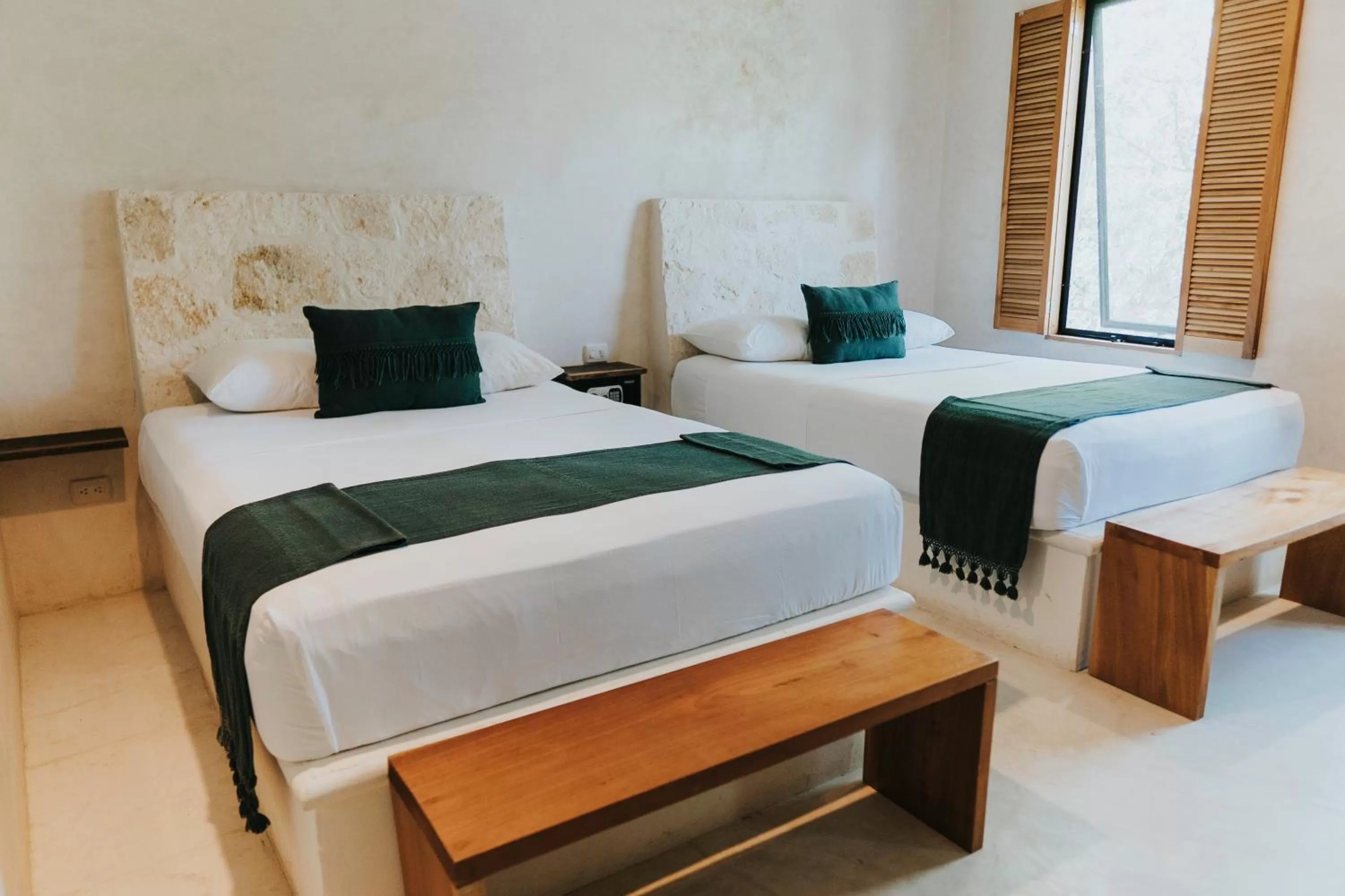 Deluxe Quadruple Room in Koos Tulum Hotel