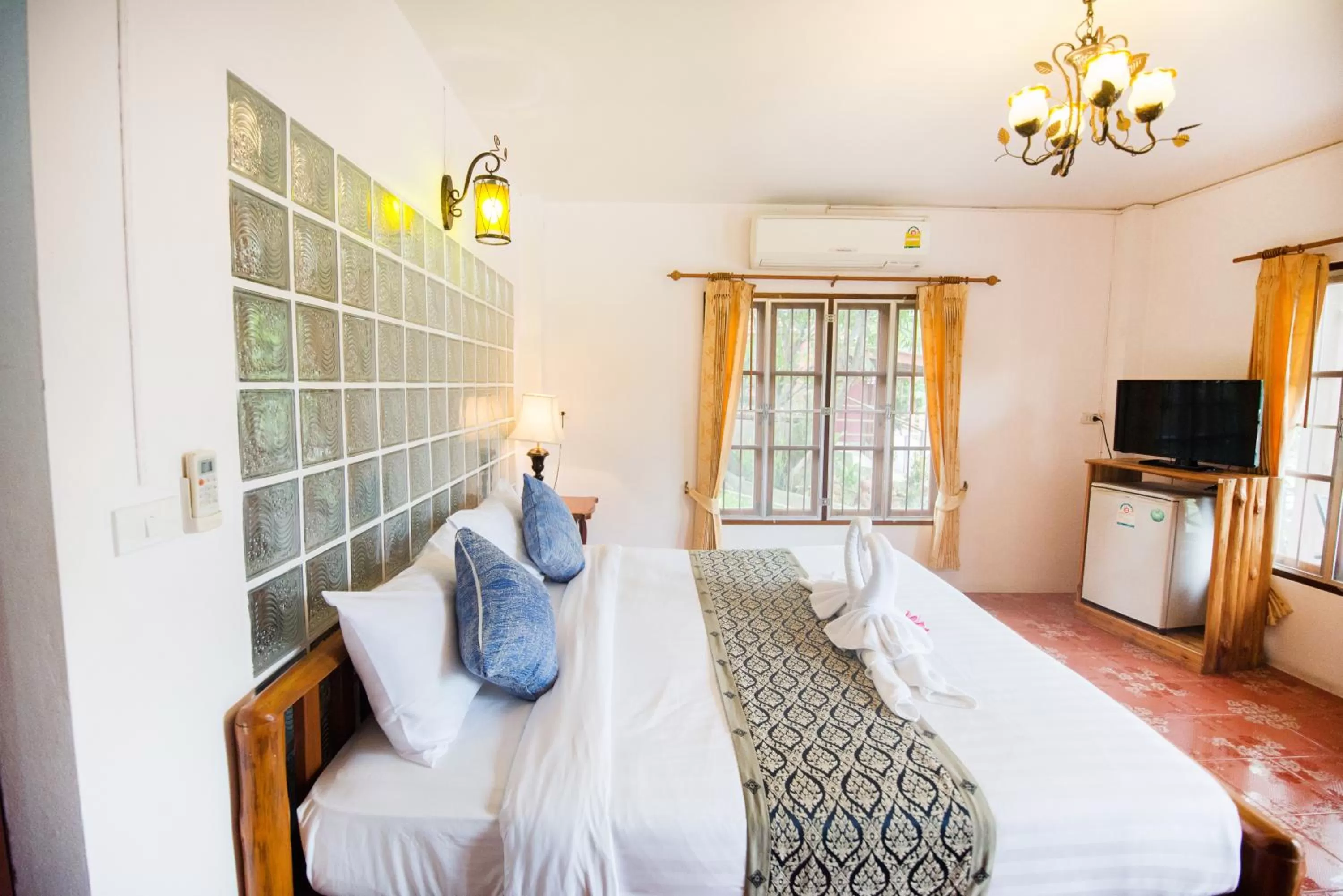 Studio with River View in Pongphen Guesthouse - SHA Plus Certified