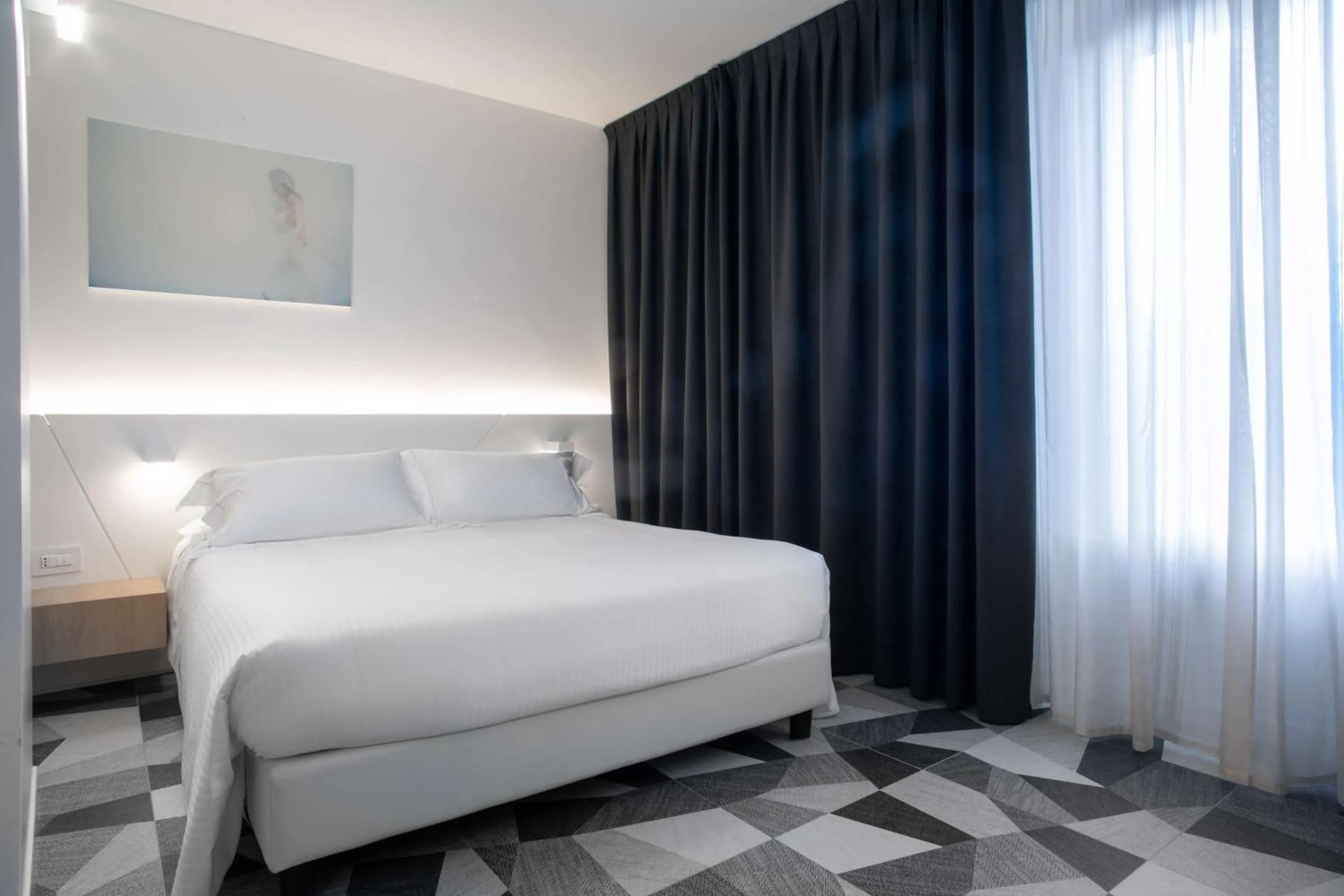 Deluxe Room with One Queen Bed and One Single Bed - single occupancy in Hotel Cappello D'Oro, BW Signature Collection