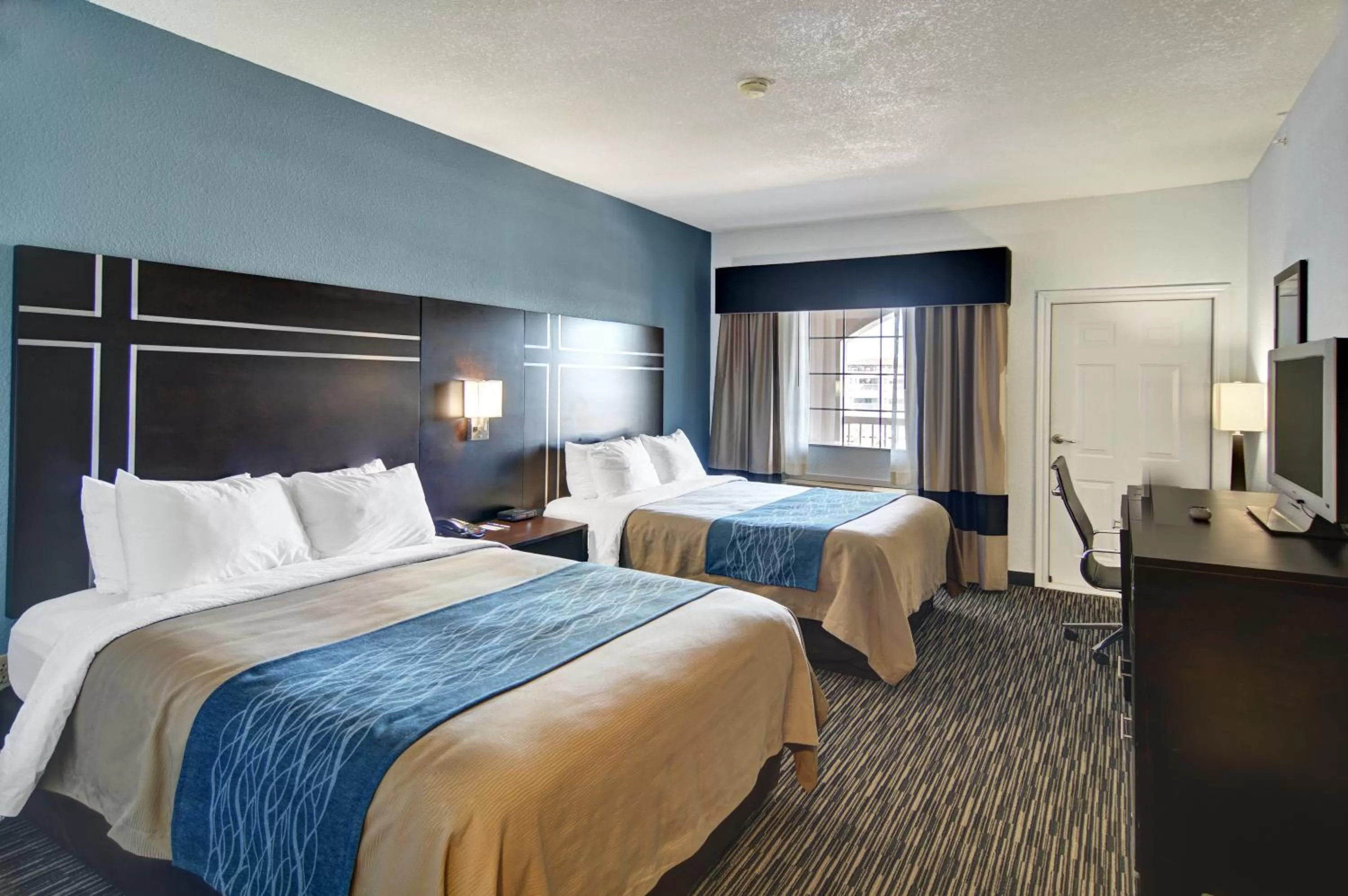 Queen Room with Two Queen Beds and Partial Gulf View  - Non-Smoking in Spark By Hilton Galveston