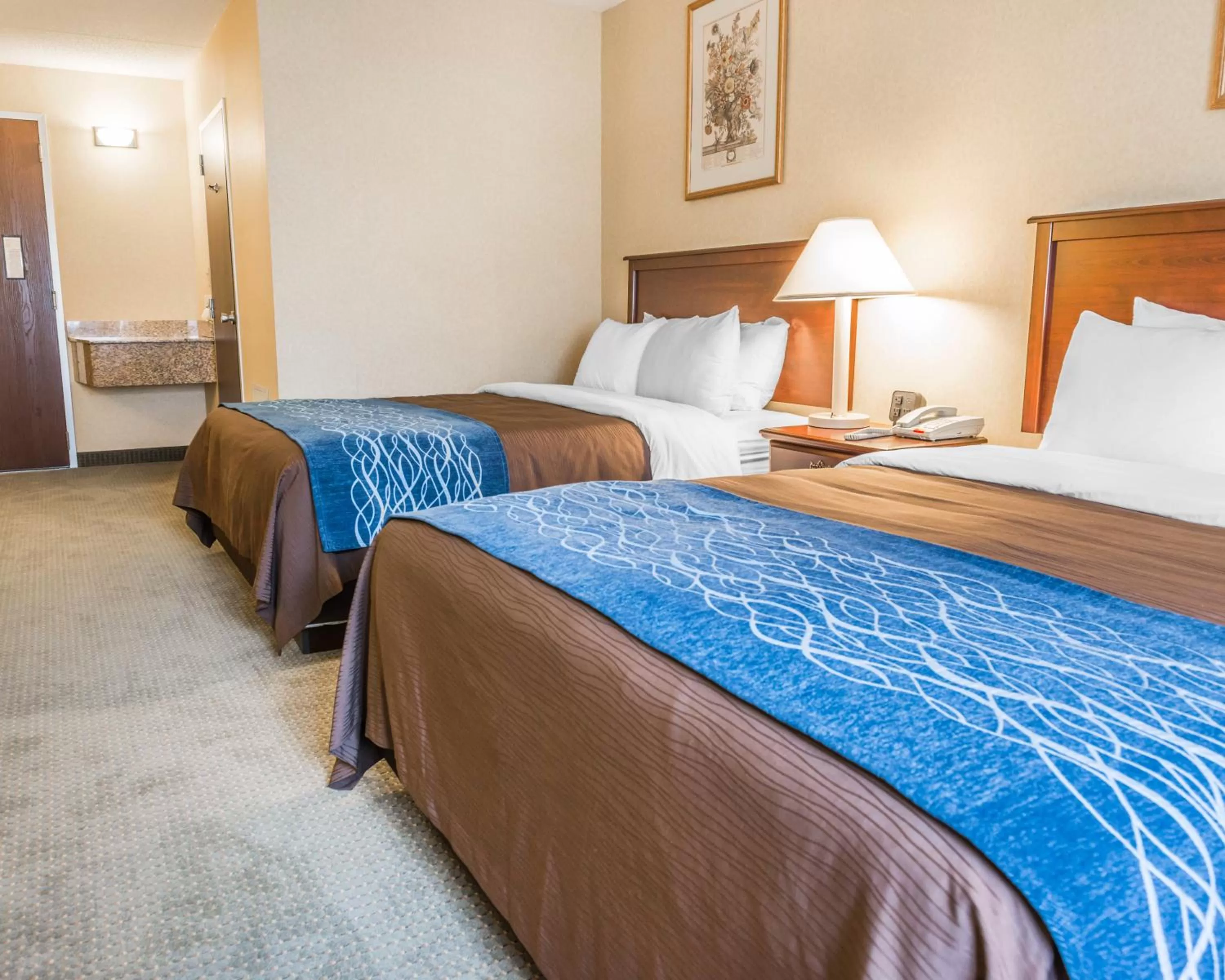 Queen Room with Two Queen Beds - Non-Smoking in Rodeway Inn Mercer I-80