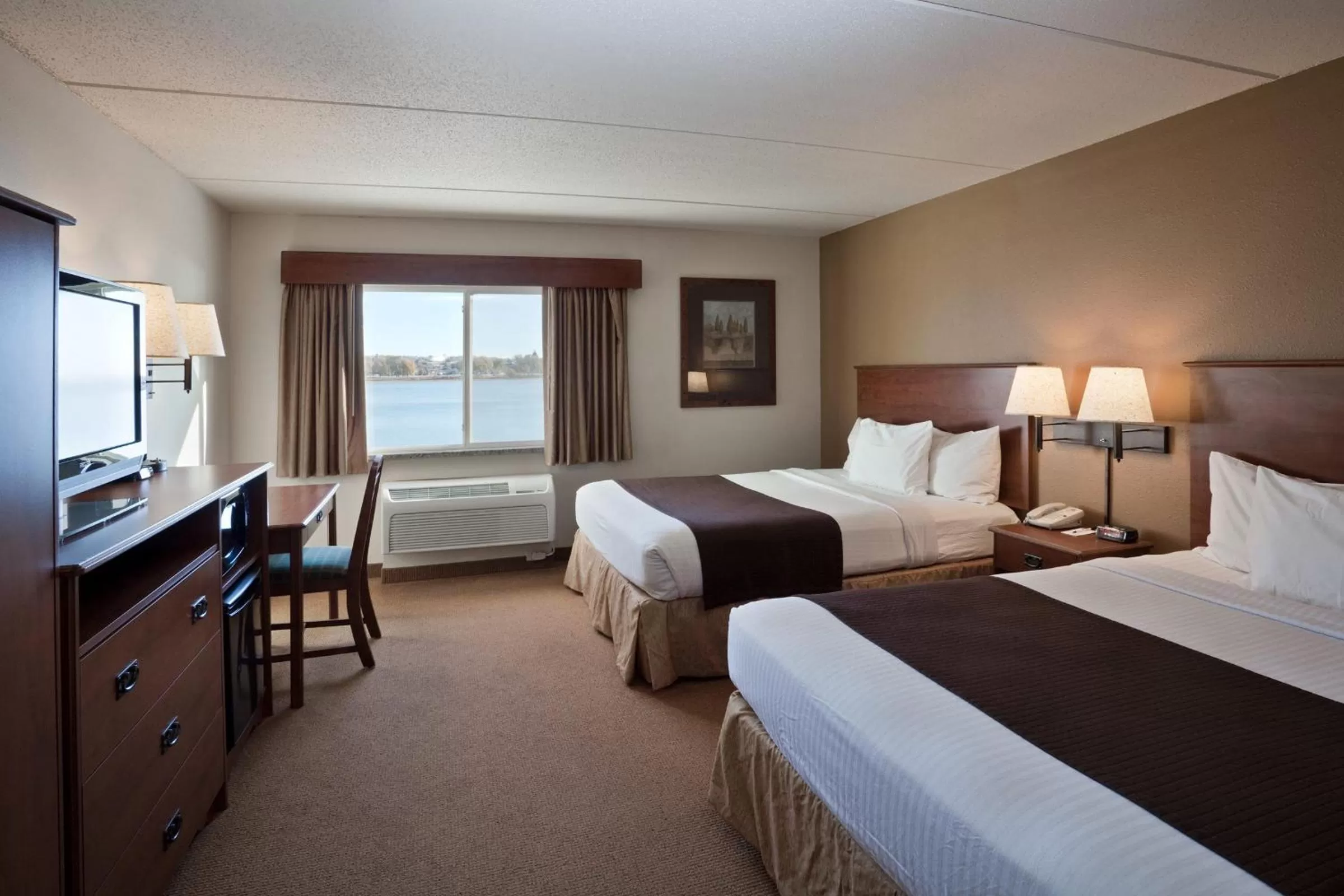 Queen Room with Two Queen Beds - Non-Smoking in AmericInn by Wyndham Fort Pierre Conference Center