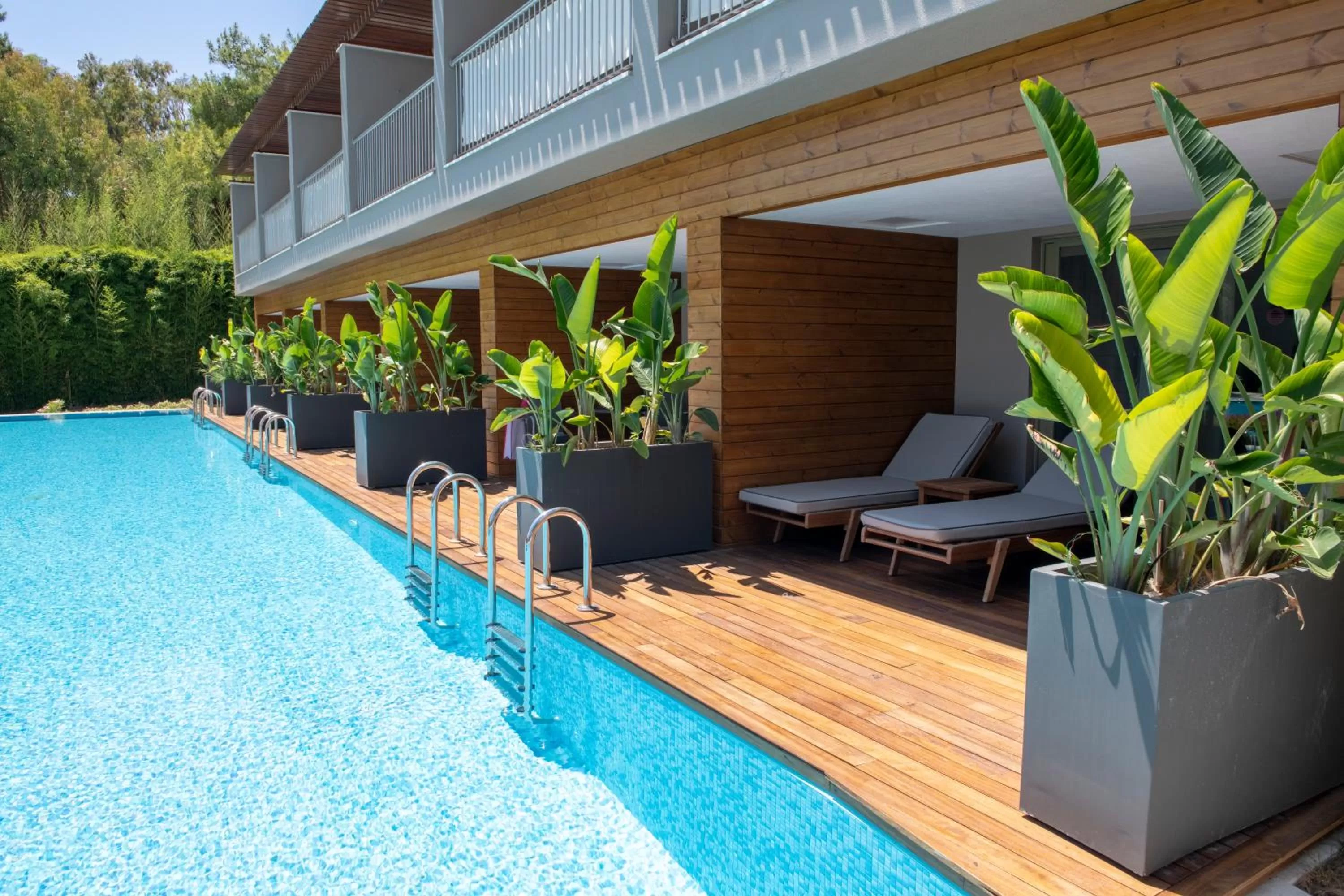 Deluxe Quadruple Room Pool Access in Barut Hemera - Ultra All Inclusive