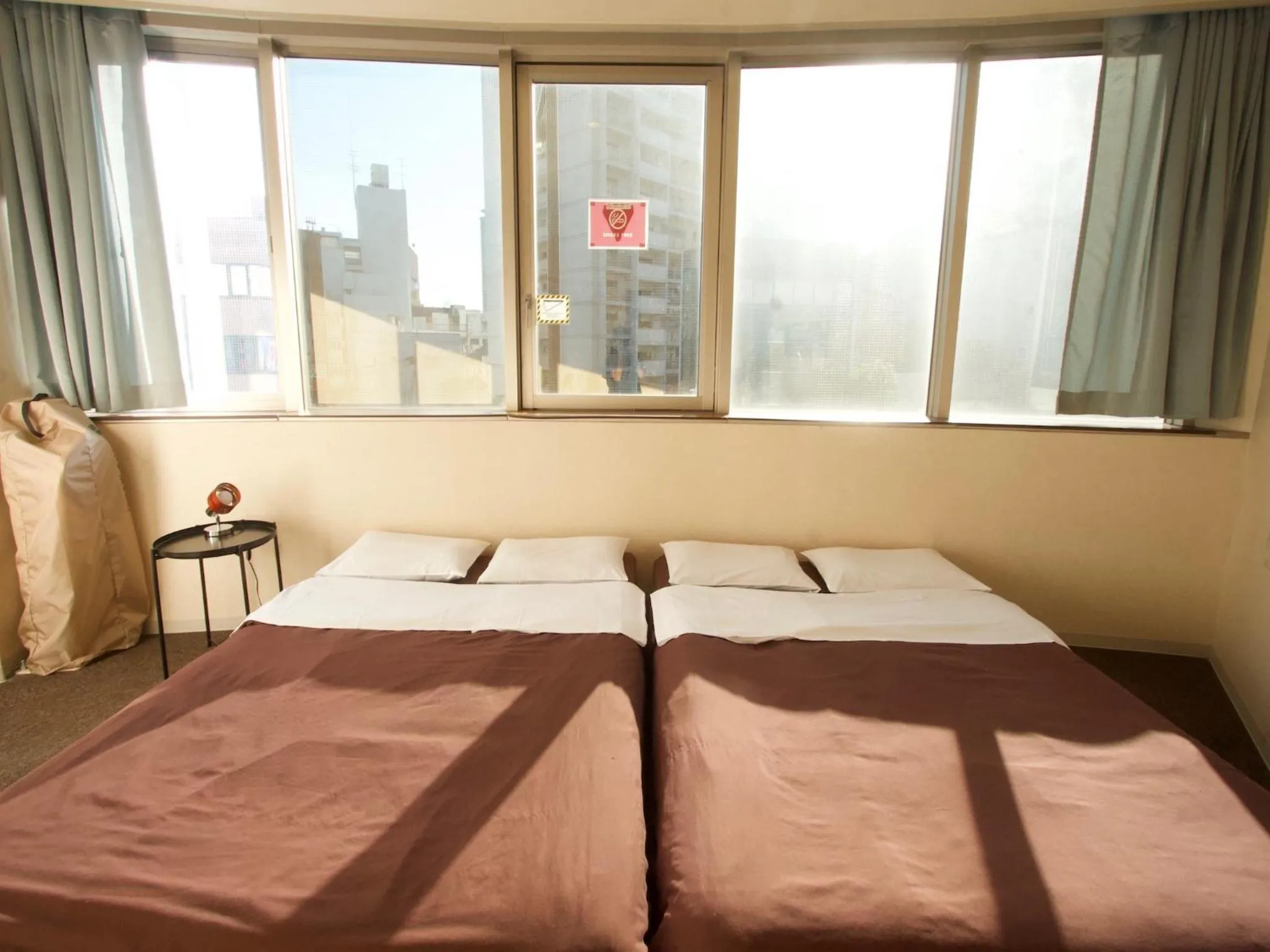 Twin Room with Two Double Beds and Shared Bathroom in Osaka Guesthouse Nest