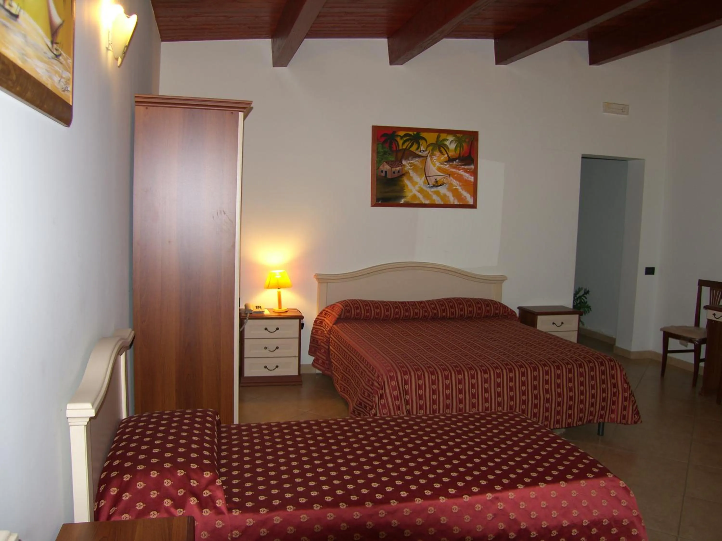 Quadruple Room in Hotel Genius