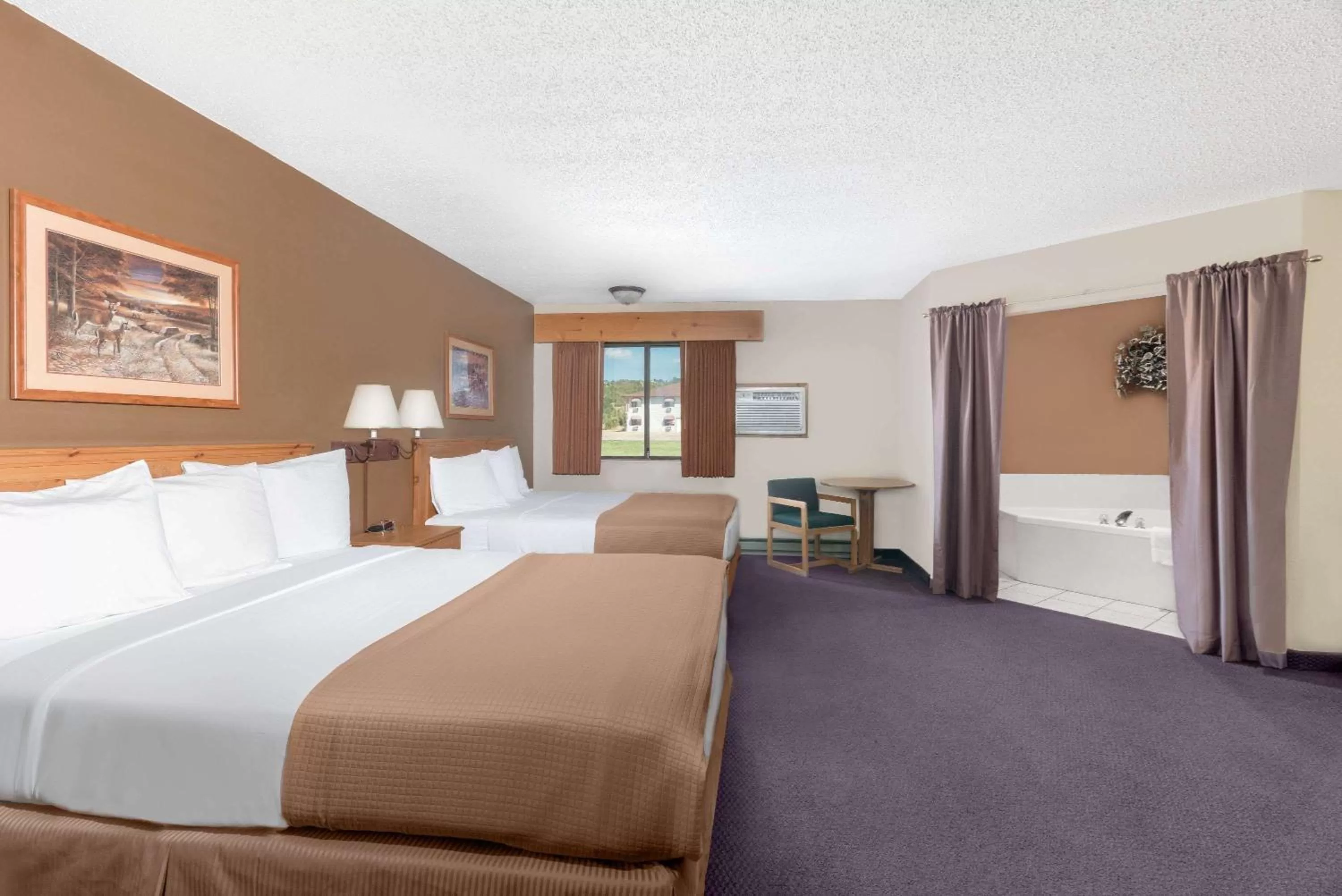 Studio Suite with Three Queen Beds - Non-Smoking in Super 8 by Wyndham Chamberlain SD