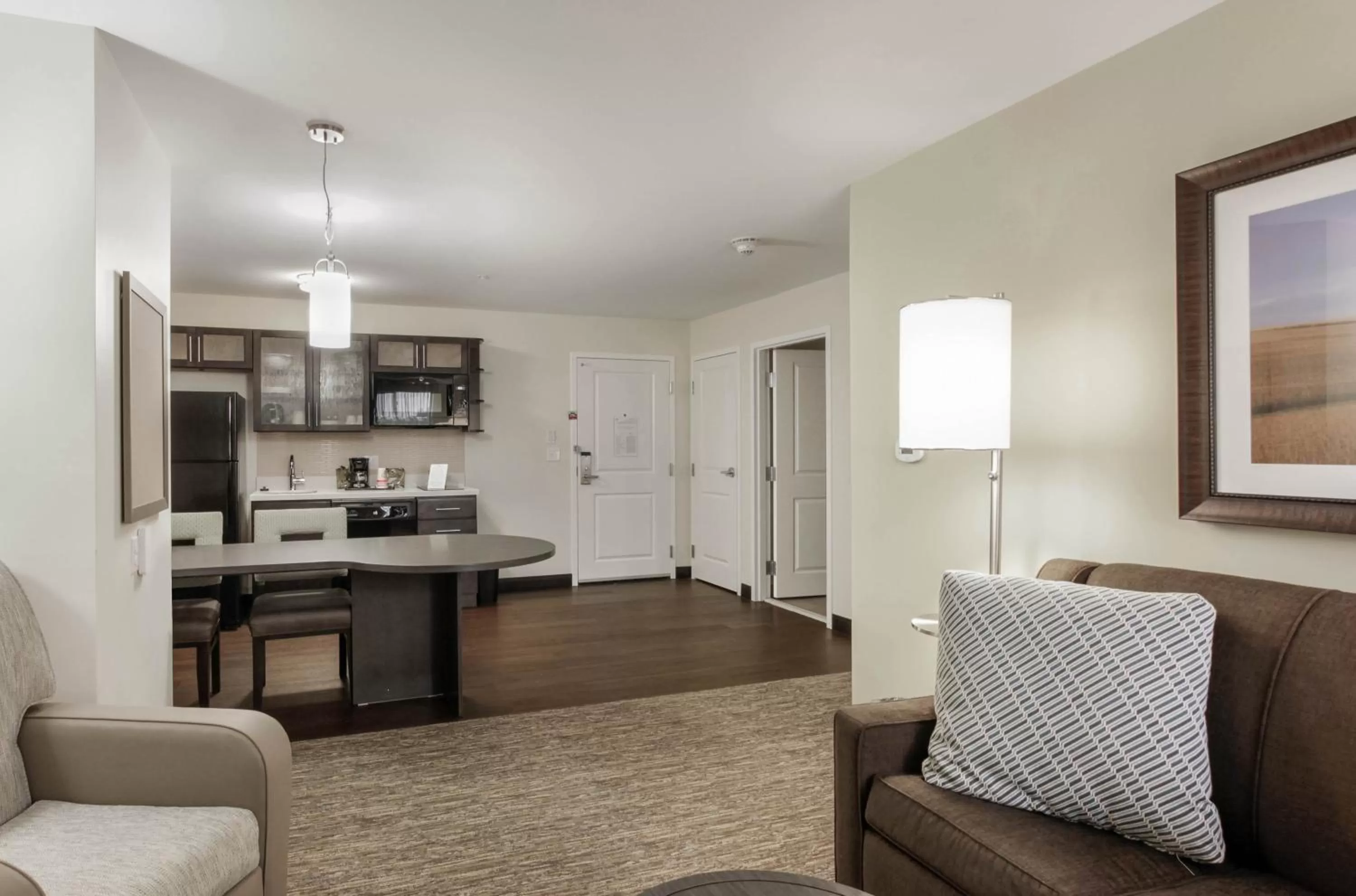 One-Bedroom Queen Suite with Dining and Sofa Bed in Candlewood Suites - Brighton by IHG