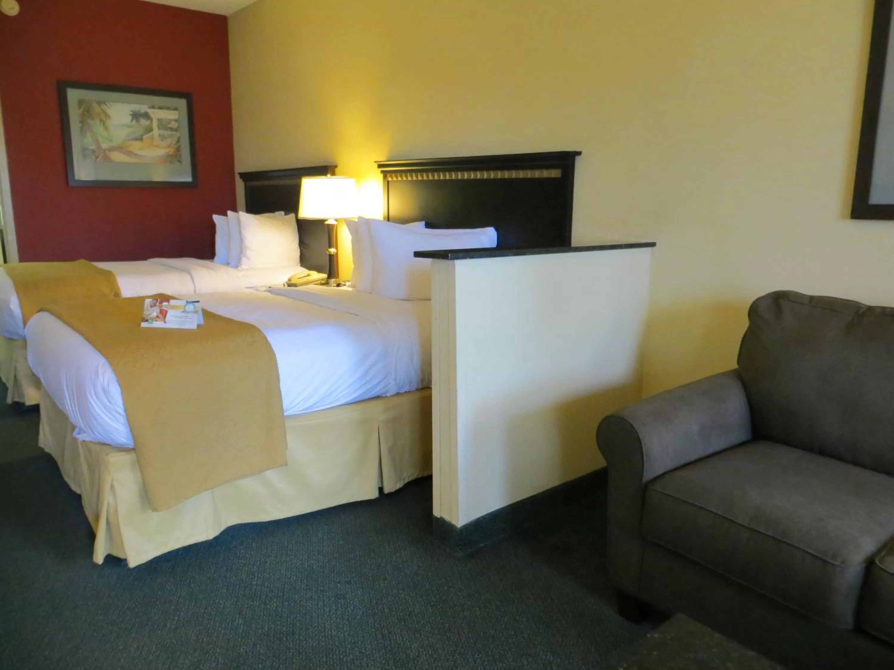 Suite with Two Double Beds with Sofa Bed - Pool View in Mi Casa Hotel