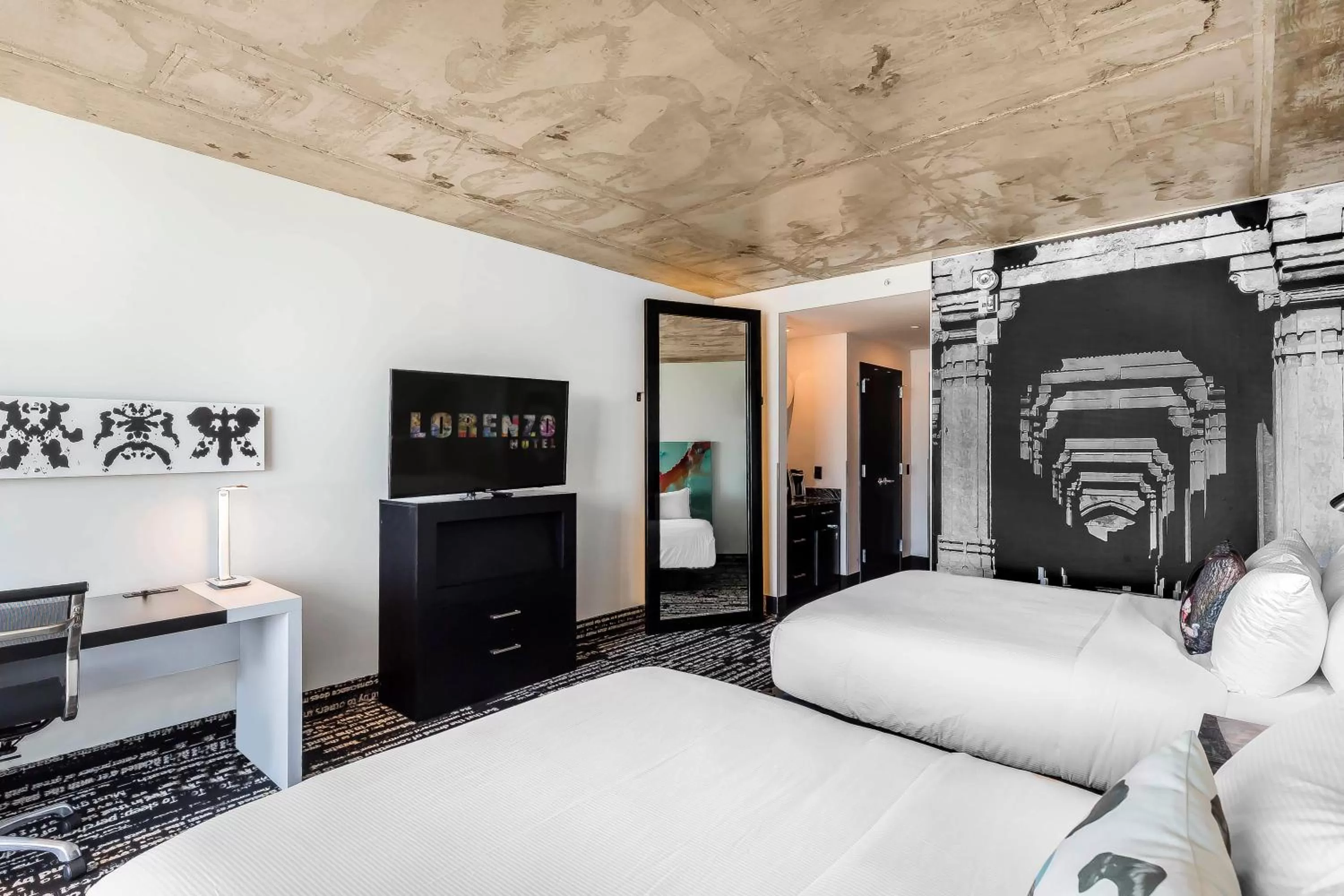 Corner Double Queen Suite in Lorenzo Hotel Dallas, Tapestry Collection by Hilton