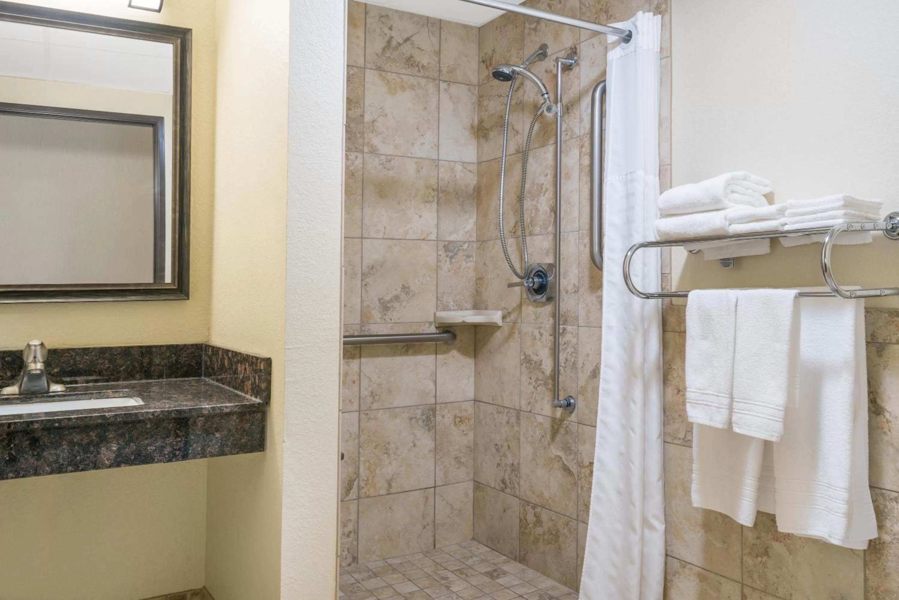 King Room with Roll-in Shower - Mobility Access/Non-Smoking in Days Inn & Suites by Wyndham Baxter Brainerd Area