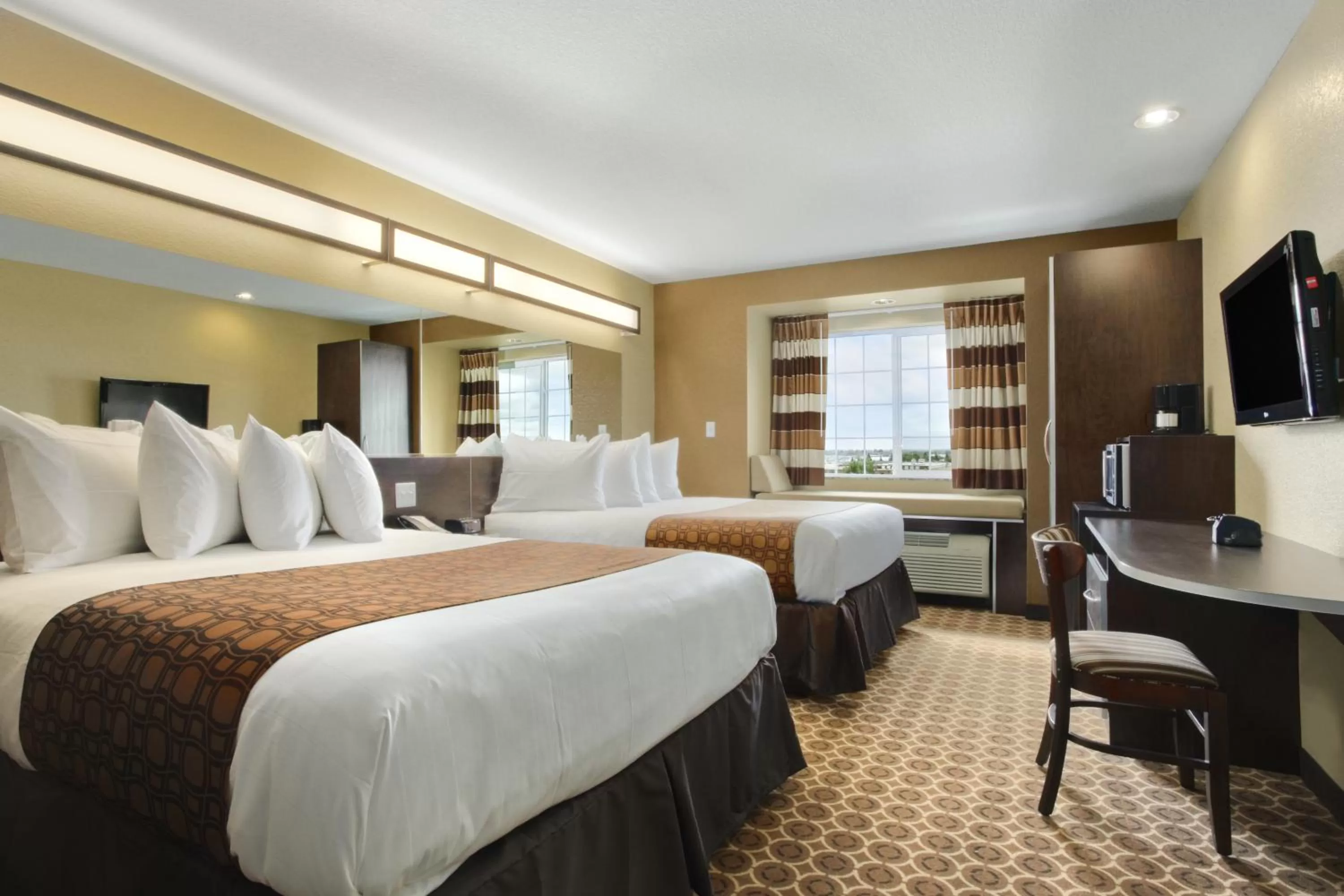 Queen Room with Two Queen Beds and Roll-In Shower - Mobility/Hearing Accessible - Non-Smoking in Microtel Inn & Suites by Wyndham Williston