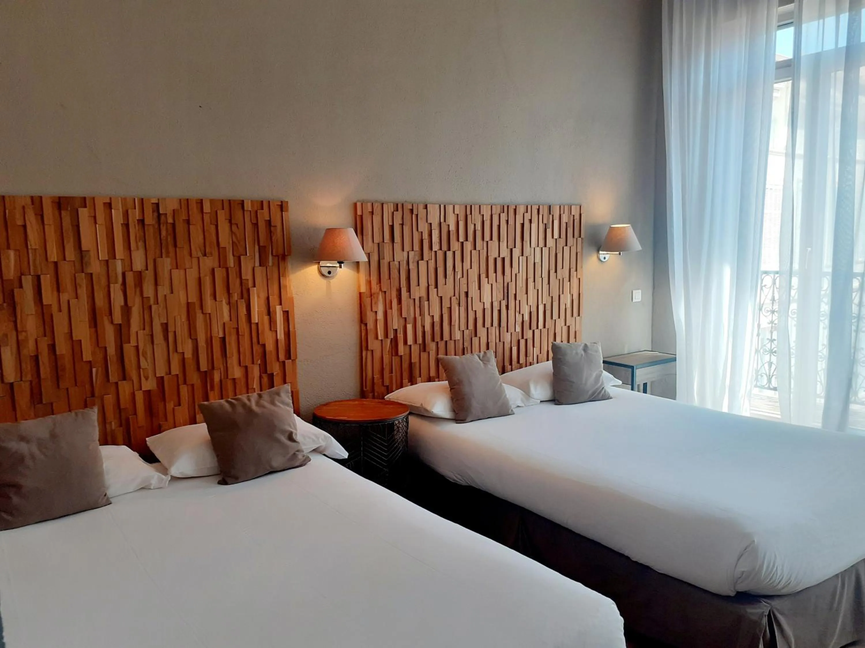 Quadruple Room with Balcony in Hôtel La Villa Tosca